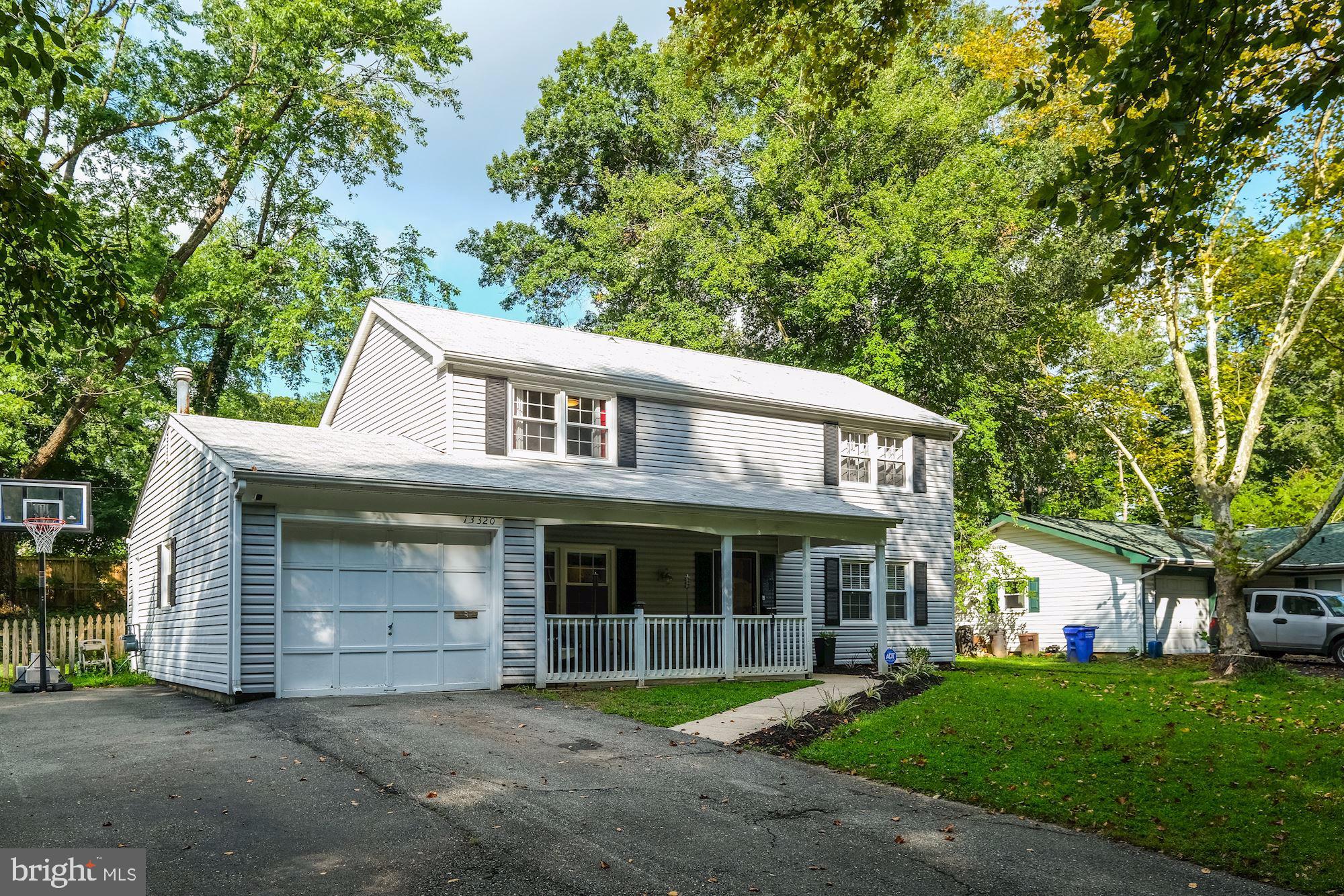 Fully renovated colonial to the very last detail. You'll enjoy entertaining in this open floor plan with added family room off the rear. Enjoy your coffee or cocktail in your fully screened three season room. Relax and kick your feet up after work in your oversized family room with custom fireplace. Enjoy wining and dining your friends in your upgraded kitchen. Upgrades include high-end stainless steel appliances and soft close cabinets. New roof within past two years.