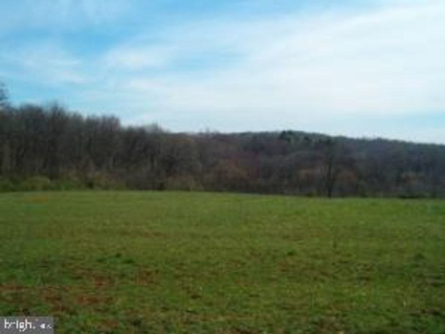 Gorgeous views, Beautiful country location surveyed septic approved lot. Any builder this lot will allow for a walk out basement. Wooded at the back portion of lot.