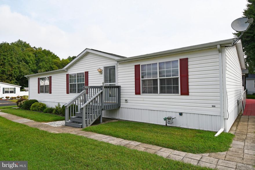 55+ Community - The Village of Cecil Woods. The Susquehanna Model -  New HVAC and Water Heater. Very generous sized rooms Large kitchen with island, master bedroom with attached bath. Walk in closets. Meticulously maintained. Community clubhouse, Exercise room, Game Room, Library and Kitchen - close to Rt 40 & Rt I-95. Buyer must obtain Park Approval. Monthly Ground Rent $512. Additionally this house has more insulation than most houses - 6-inch outside walls have R19 insulation, floor has R22, and ceiling has R32.  A/C unit is also a heat pump that will heat the house when outside is above about 38 degrees and is cheaper than using the furnace. Furnace is only used when colder or 'emergency heat' is selected on thermostat.