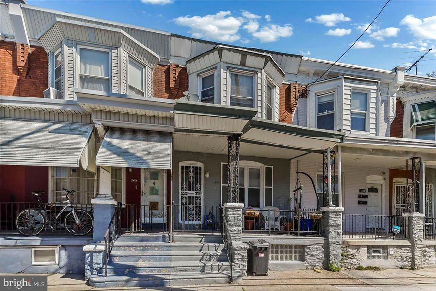Welcome to 5451 Pine Street — a classic West Philadelphia rowhome that delivers space, character, and smart updates in all the right places.

Step inside from the inviting front porch into a bright, open living and dining area where original hardwood floors and timeless architectural details create warmth and continuity throughout the main level. The layout flows naturally into a thoughtfully renovated kitchen featuring white cabinetry, quartz countertops, stainless steel appliances, gas cooking, and a dedicated pantry for everyday functionality.

Upstairs, four well-proportioned bedrooms offer flexibility for sleeping, working, or creative space, all centered around a refreshed full bathroom with updated tile, vanity, and fixtures. A convenient first-floor powder room adds everyday ease.

The full basement spans the length of the home with high ceilings and excellent storage potential — or future finished space. Out back, a private fenced yard offers room to relax, entertain, or garden.

Positioned in a vibrant West Philadelphia location, 5451 Pine places you minutes from University City, Penn, Drexel, CHOP, and HUP, with easy access to Center City, major highways, and multiple SEPTA routes for a seamless daily commute.

A compelling opportunity to step into space, value, and location — all in one.