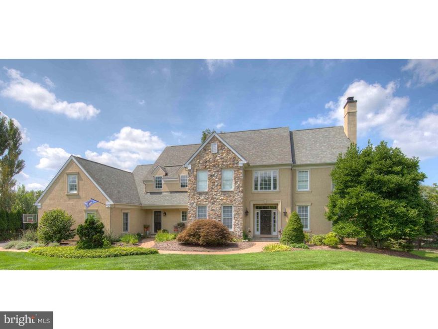 This magnificent center hall colonial home is 16 years young and has been meticulously maintained, decorated and updated over the years giving you a truly move in condition home that has all of the amenities you would want. When you walk into the home, you are greeted by a spacious center hall with the Living Room to one side and the Dining Room to the other. The Living Room has a marble fireplace and has French doors into a private Study.  The Dining Room is very spacious, as are all of the rooms and they are all flooded with natural light. As you pass through the Dining Room you enter a new Butler Pantry with a built in wine cooler and plenty of granite counter space and ceiling high cabinets for storage. Off to one side is the Family Room with a vaulted ceiling, stone fireplace and built in Cherry cabinetry.  To the other side is a new Kitchen and Breakfast area.  There is a full array of high end appliances including stove, double oven, fridge, microwave and an under counter fridge; a large center island and an abundance of counter space and cabinets.  The counters are all granite.  The Breakfast Room has a stone fireplace, plenty of light and access to the 2-tiered slate patio. In this area is a Mud Room, Pantry and 1 of 2 Powder Rms on this floor. It also gives you access to the oversized 3 car garage.  As with the first floor, all of the bedrooms are spacious and have more than ample closet space. The Master Suite has a newly remodeled Master Bathroom with heated floors, 2 Walk in Closets and a quaint Sitting Area.   There are 4 more bedrooms and 3 other bathrooms on this floor as well as the Laundry area. One bedroom is actually a suite with a sitting area and a newly remodeled bathroom. The Lower Level is fully finished and has a Media Room, Exercise Room, large Den, an open area, Wine Room, Full Bathroom and Bedroom. It also has direct access to the outside. It is approximately 1,800 sq ft and provides so many options on use. The rear tiered slate Patio provides a great place for entertaining or to relax at the end of the day. It has a built in grill, a 2 burner cook top and is surrounded by granite counters and there are no homes at the end of the property line providing a very pleasant view.  The home is on a cul de sac street and is very private, yet is located close to transportation, shopping, entertainment and major roads.  This home is what you have been looking for!