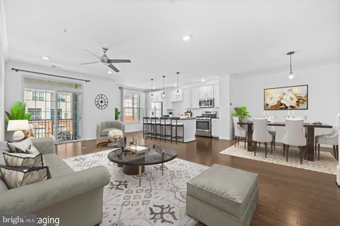 Photo of 23276 Southdown Manor Terrace #115, ASHBURN, VA 20148 (MLS # VALO2117652)