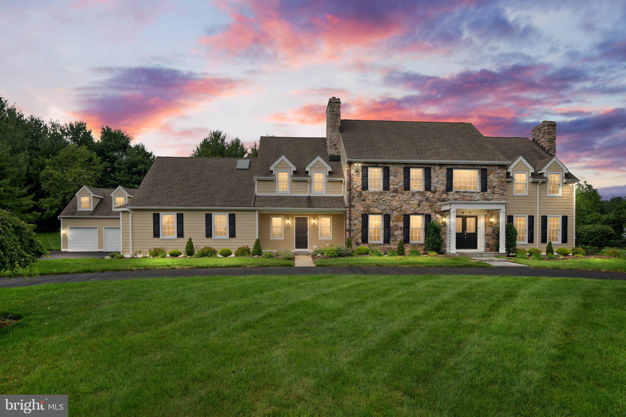 Welcome to 14 Avondale Dr. located at the end of a quiet cul de sac, on a private 2.3 acre lot in the highly sought after Sycamore Farm community in Upper Makefield & the award winning Council Rock North School District. When you drive up the circular driveway you will fall in love with the classic colonial style stone & hardie board siding & the home's beautiful curb appeal. Step into your bright and airy grand two story foyer with hardwood floors that flow throughout almost the entire house. The foyer is flanked by a formal living room & dining room both with deep dental crown moldings. The living room offers a fireplace with wooden mantel & the dining room has gorgeous overlay wainscotting. Continue into the stunningly renovated gourmet kitchen with rec. lights, a long island, with pendant lights, 2nd sink, high end Miele, and Bosch Stainless Steel appliances, instant hot tap, 2 dishwashers, separate built in full size refrigerator & freezer, pot filler over the 6 burner stove w/ griddle, a total of 4 convection/steam ovens, warming drawer & wrap around peninsula with additional seating. The kitchen opens to a breakfast area with another fireplace & sliding glass doors to the paver patio overlooking the peaceful & serene backyard. Off of the kitchen sits the family room with a stone fireplace, rec. lights, coffered beams & a wet bar with granite counters, beverage fridge & sink. There are also two points of access to the backyard. Off the kitchen also sits an updated powder room, a butler's pantry with 2 wine fridges & a sink, plus a tiled mudroom with its own entrance, 2 closets, additional storage & a bench area. Continuing down the hall on the first floor you’ll find the 1st floor 5th bedroom w/ a ceiling fan, walk-in closet, another double wardrobe closet & an updated en-suite bath w/ dual sinks & tiled shower. Continue on & you’ll find a large office with chair rail, ceiling fan, double wardrobe closet, large utility room w/ a washer, dryer, fireplace & additional storage. Could be another bedroom, or family room. This wing could have it's own entrance easily created & already has another powder room in the hallway so is perfect for an in-law suite, or private home office. All of this plus a total of 5 garage spaces completes the first floor.
Head upstairs to the absolutely stunning primary suite w/tray ceiling, ceiling fan, stone fireplace, a sitting room with access to your private balcony overlooking the yard, a gigantic walk-in closet w/custom built-ins & organizers plus two skylights. The primary en-suite bath offers radiant floor heat, dual vanities, a makeup counter, a relaxing air tub w/ a Moen digital faucet &a luxurious walk-in steam shower w/ two rain shower heads, multiple body sprays, Koehler digital controller, heated floor & bench & a seamless glass door. The 2nd floor offers 3 more large bedrooms each with ample closet space & their own private en-suite baths, plus a second floor laundry room.
Head downstairs to the huge finished basement with a great room, game room, rec room, gym & a large storage area. Now head back upstairs and outside to your secluded new oasis. Step out onto the large paver patio with an outdoor bar, 2 covered areas w/ extendable awnings, a fenced in heated ozone pool & spa, a raised garden w/ drip irrigation system & still plenty of additional room to play.
All of this plus newer Timberline Architectural Roof, Hardie Board Siding, Replacement windows, doors, & skylights, newer 4 zone HVAC, a whole house generator & 2 attics. Only minutes from historic downtown Newtown, or New Hope w/ all of the entertainment, fine dining & boutique shopping. Also near some of the area’s best State Parks like Tyler, Washington Crossing, or the DCNR Canal, plus close to the major roadways, or the train for an easy commute & in the highly rated Council Rock North School District. Welcome to 14 Avondale Dr. Maybe you are home already…