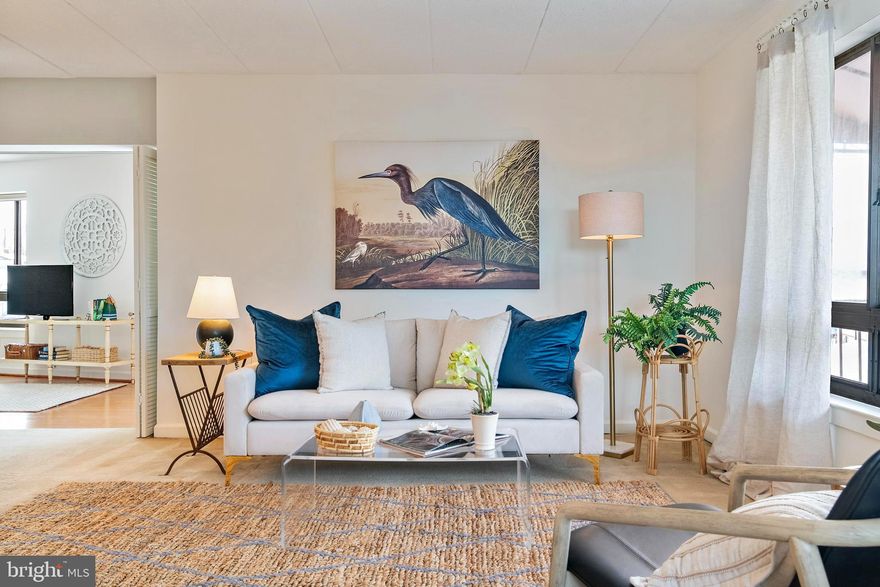 Great Eastport location! This desirable two-bedroom, two-bath 1104 sq. ft. end unit condo is perfectly situated in the heart of Eastport, offering exceptional walkability to neighborhood favorites, downtown Annapolis, and the waterfront. Located on the second floor, the home features an open, light-filled layout with views overlooking the local boatyards, The Chart House restaurant and marinas. At night the unit glows with the setting sun  and  Saint Mary's Chapel stands tall in the night sky. 
Step outside onto a large, oversized balcony, ideal for morning coffee or evening relaxation while taking in the maritime surroundings. The spacious primary suite includes an ensuite bath and walk-in closet, providing comfort and privacy. A second bedroom and full bath offer flexibility for guests or a home office.
The condo also includes a deeded garage parking space, a rare and valuable amenity in Eastport and an elevator building. Whether you’re looking for a full-time residence or a low-maintenance retreat, you simply can’t beat this location—steps to dining, shopping, and all that Annapolis living has to offer.