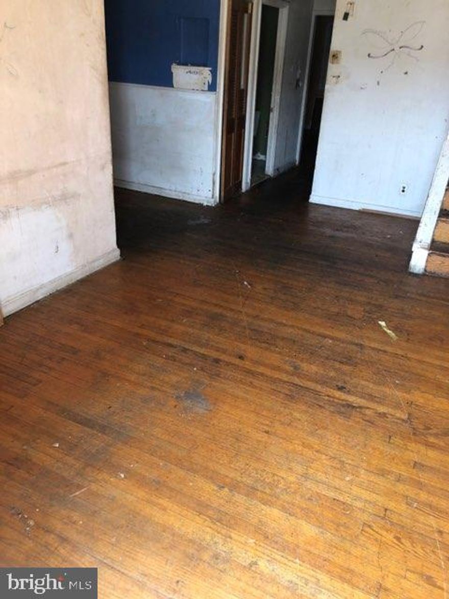 Foreclosure! 3 bedroom home in need of total renovation. No utilities! Bring flashlight and use caution when showing. This property is sold in as-is condition. Seller expresses no warranty or guarantees.  Buyer responsible for U&O.  Easy to show!