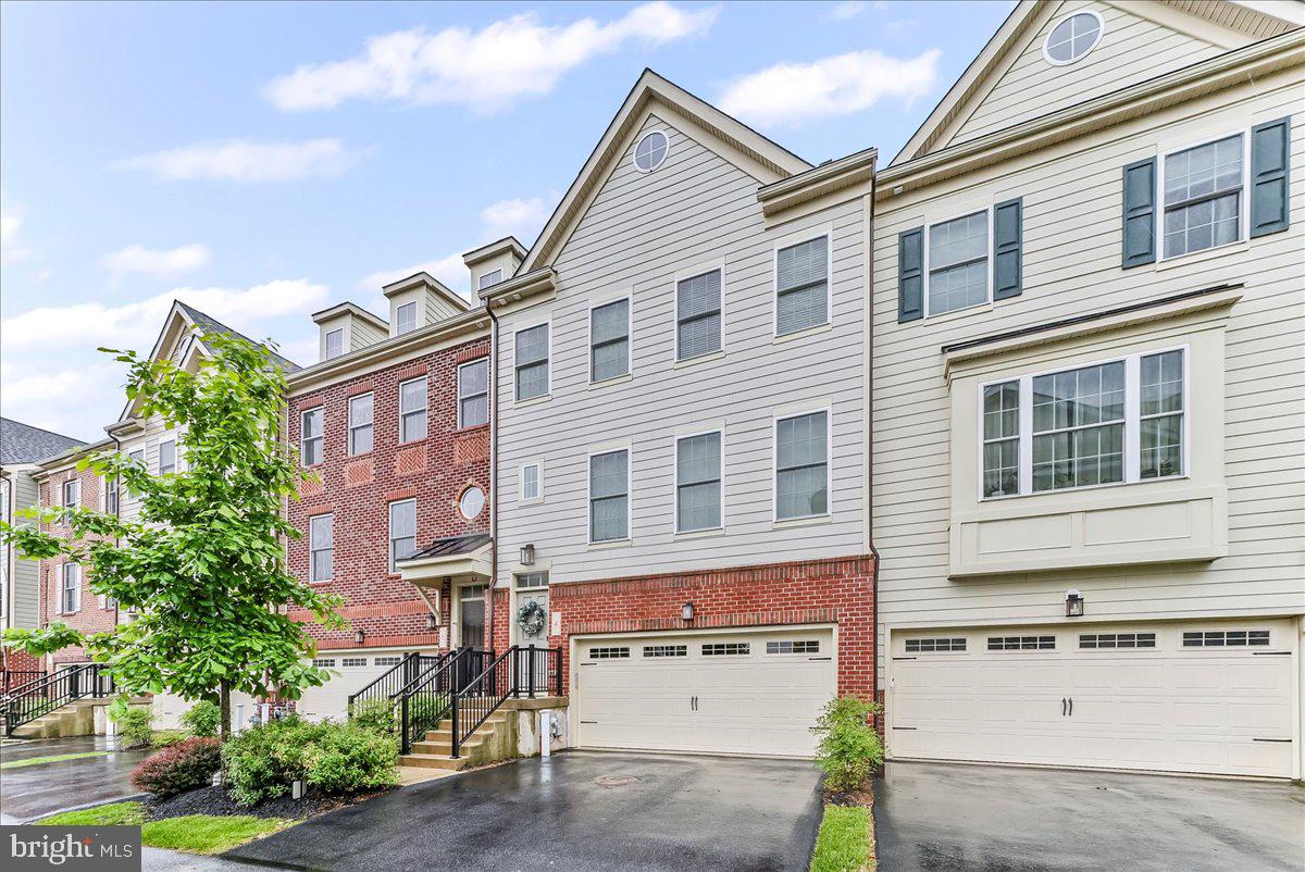 Stunning Townhouse in Desirable Chesterbrook Welcome to this beautifully maintained townhouse in the heart of Chesterbrook—offering the perfect blend of modern comfort, thoughtful updates, and timeless charm. Step inside to find gleaming hardwood floors and an open-concept main level designed for both relaxing and entertaining. Enjoy integrated speakers, all-new designer lighting, and custom window treatments that enhance the home's inviting atmosphere. The fireside living room flows seamlessly to a private deck, complete with an automatic awning—ideal for an evening cocktail or quiet mornings. Upstairs, you’ll find three spacious bedrooms with large, custom closets. The third floor features a private suite with its own bath and generous closet space—perfect for a guest retreat. The finished lower level offers additional living space with a half bath, large closet, and walk-out patio, expanding your options for entertaining and everyday living. Every inch of this home has been meticulously cared for, reflecting pride of ownership throughout. Don’t miss your chance to live in one of Chesterbrook’s most sought-after communities. Agent is related to the sellers.