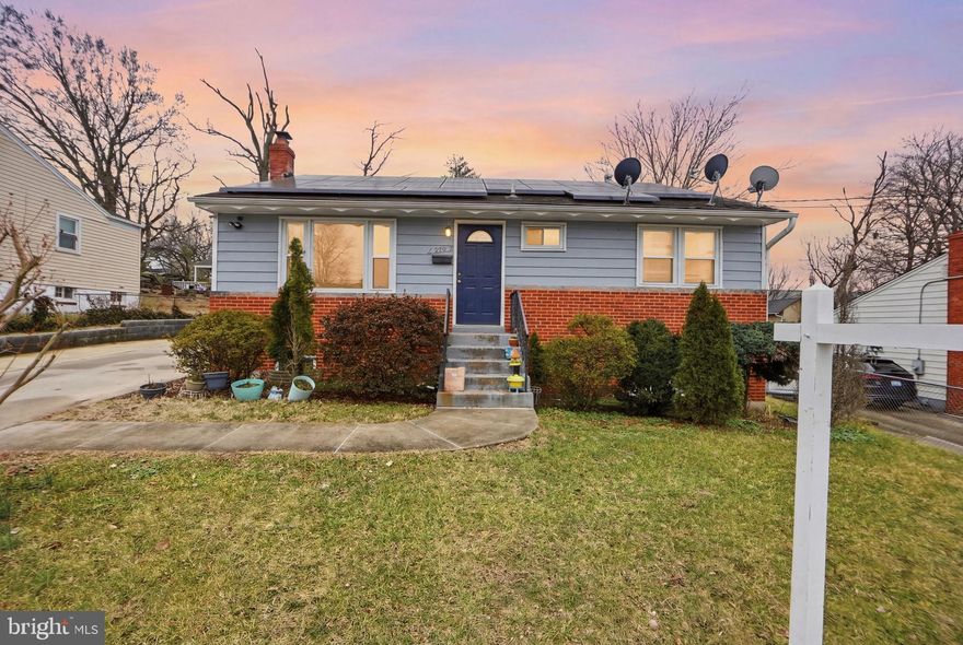 Well-maintained 4-bedroom, 2.5-bath home in a convenient location close to major highways, shopping, dining, and Fort Meade. This property offers both comfort and efficiency, featuring a roof replaced in 2020 and fully paid-off solar panels that convey with the property to help reduce energy costs. Priced to offer strong value for the area.

The main level includes a spacious living room, a large primary bedroom, and two additional generously sized bedrooms. The kitchen provides plenty of space for dining and everyday gatherings.

The finished basement adds valuable living space with a legal bedroom, full bathroom, two bonus rooms, and a separate kitchenette. The lower level offers flexible living space that can accommodate a home office, recreation room, gym, or additional living area, and provides flexibility for guests or extended living arrangements.

Outside, the property features an expansive concrete driveway and rear patio area, providing ample off-street parking and space for entertaining, outdoor enjoyment, or additional storage while maintaining privacy.

Conveniently located near commuter routes, shopping centers, and major employment hubs including Fort Meade, this home offers both space and accessibility.