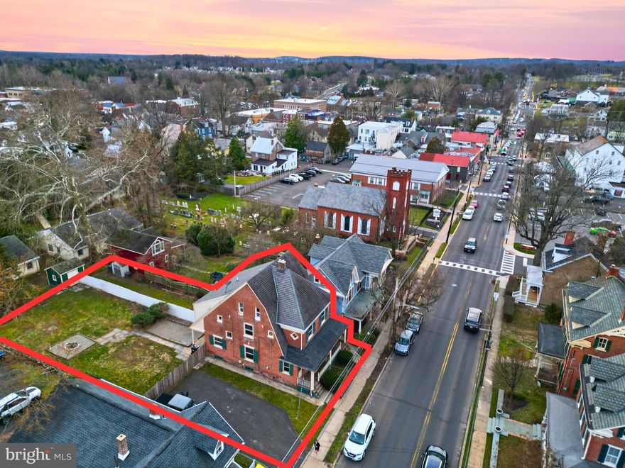 If you've been searching for the perfect passion project, look no further! Welcome to 108-110 E Washington Ave - Located in the absolute heart of Newtown Borough, this "diamond in the rough" gem of a property has been quietly sleeping, patiently waiting for the perfect Buyer to creatively rejuvenate its soul. Built in 1910 and totaling about 3300 sq ft, the home is currently divided into two separate sides (uniquely enough, all under one tax parcel). Each side consists of a charming front porch, living & dining room, kitchen, three bedrooms and third floor bonus space. The oversized backyard area is truly massive (especially for in-town living) and provides ample space for gardening, outdoor entertaining or just about anything your heart desires! One of the most important factors to consider when purchasing a property, whether it be for a personal residence or as an investment property, is what contributes to a strong resale value? The answer is simple: LOCATION. This property boasts coveted walkability to Newtown's shops & dining scene, and is located within the acclaimed Council Rock School District. With so little inventory available in Newtown Borough and home values rapidly on the rise, this is a smart (and rare) opportunity to acquire “the best of both worlds”. Consider reviving the property, living on one side and renting out the other for additional residual income. There are endless paths one can take while curating the re-inspired direction of this property; like everything else in life, when you put a little money, time and love into something, the end results will never disappoint! Polish this diamond the right way, and the results are sure to sparkle bright.