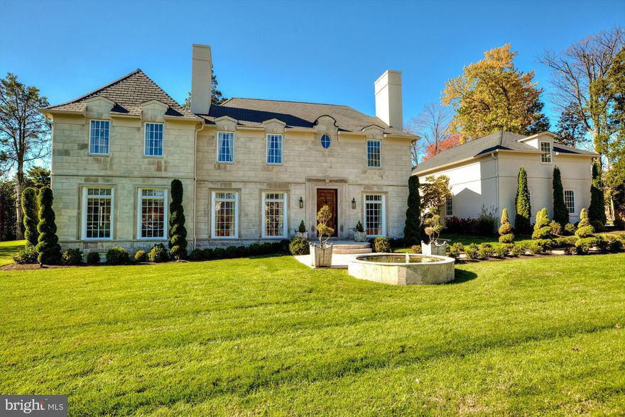 Stunning 8,000sqft custom residence perfectly sited on beautifully landscaped level lot w/pool.   Clad in limestone, this timeless home features a modern flr plan, perfect for elegant entertaining & casual family living.  Gorgeous marble kitchen, sun-filled family room, spacious master suite boasting his & hers bathrooms.  Covered porch w/fireplace.  Outdoor kit. Guest suite above detached garage.