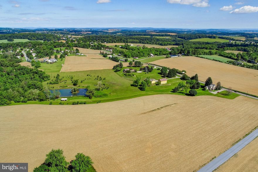 Explore the possibilities this 161.5 acre property located in both Windsor and Chanceford Townships has to offer. Residential and Agriculturally zoned. Gorgeous and peaceful with rolling acreage. Located less than 10 minutes to small-town Red Lion Boro, Quick commute to I83, Shrewsbury and Glen Rock Exits. Road frontage along Rt74/Delta Rd, Zimmerman Rd and W Snyder Corner Rd. Most public utilities available. Currently property consists of 4BR, 3.5BA sprawling ranch-style stone home with 2nd floor, 3-unit tenant occupied farmhouse, wood/stone barn, pole building and large pond with dock, outhouse, fountain and its very own island. Site Design Concepts subdivision plan has been approved by Windsor Twp.  AGENTS - Please Read Agent Remarks.