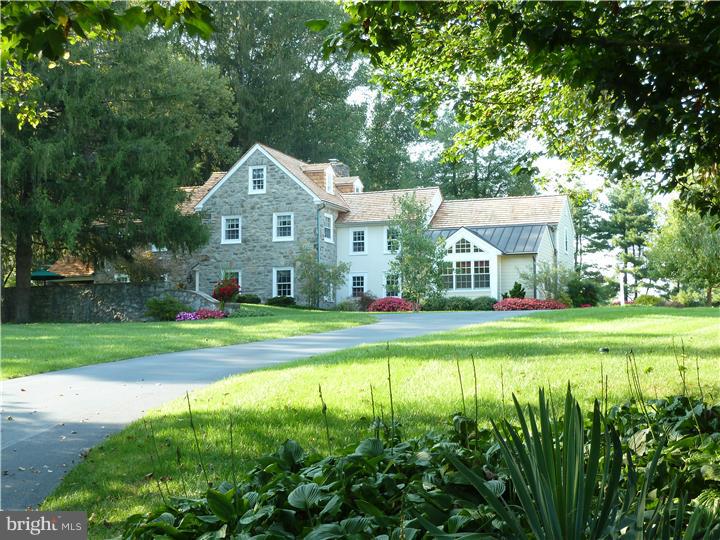 This stunning property combines the charm of an antique Chester County farmhouse with all of the amenities you expect in a luxury home! All of the Baths are worthy of placement in "House Beautiful" and the newer, gourmet Kitchen features high end appliances, 2 dishwashers, ample granite counter space, custom cabinetry, and adjoins a stunning new Breakfast Room with a wonderful view of the lawns and gardens. Like to entertain? You'll love the Wet Bar with a wine refrigerator. If desired, there is a Main Level Laundry hook-up a few short steps from the Kitchen. The privately set property has been impeccably maintained with newer windows, a new shake roof on the house and barn, and the exterior of both has been freshly painted. The oldest part of the home is thought to be c. 1825 with newer additions that have been seamlessly added over the years. The home has six bedrooms and an office that could be an additional bedroom if needed. The antique Barn has room to park several cars on ground level and its loft could be converted into a "Party Barn" or spacious game area (like basketball court). This charming home is perfect for those seeking a private yet convenient location as well a classic country home. The 2 BR, 1 BA Tenant House is in very good condition, sits on its own tax parcel, and rents for $1,800 per month. Look at the photographs and then come look for yourself. You will not be disappointed! (Note: the property is also available without the adjoining 2BR, 1BA tenant house on 1+ acre for a price of $894,000)- see MLS #6458774