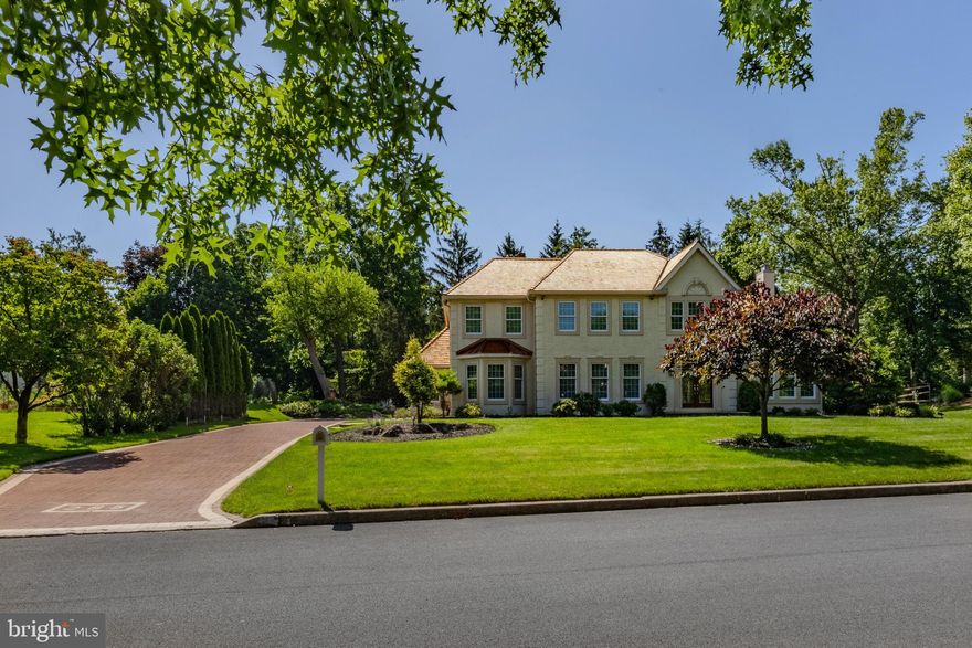 Retreat living at The Ridings of Whitpain.  Welcome to 285 Ridings Way, which was the original model home of this established community that offers a wonderful centralized location, but that makes you feel far away from the hustle and bustle.  This beautifully updated and classic 2 story foyer home has all the bells, whistles, charm and amazing square footage to include a 1st floor in-law quarters with exterior access!  Pull up to this gorgeous property and immediately notice the attention to detail with the brand new cedar roof,  driveway, 2 car attached garage and stunning front entry.  The center hall foyer greets you with natural light beaming from each direction.  The first floor has an amazing circular flow to include large living spaces such as the gourmet kitchen with upgraded granite countertop and backsplash and appliances that open right up to the sunken great room with pin oak floors and custom built-ins.  The formal living room, dining room and office are all large in size.  The perk of main level laundry is a given in this incredibly designed home and is accessed right off the kitchen.  The in-law or au pair suite has a full bath, great living space and exterior access for convenience.  The backyard oasis at this home is out of a magazine.  No expense was spared in creating this beautiful entertainment space to include an outdoor kitchen area with built-in grill, fridge, kegerator and countertop.  The sitting walls, paver style covered patio and lush landscape with an in-ground sprinkler system makes for magic place. . Privacy and tranquility are the 2 words that come to mind when describing this space and how it elevates the property.  Upstairs you’ll find large and naturally sunlit bedrooms to including a large primary suite with walk-in closets, a large bathroom with soaking tub, a glass surround fireplace, and vaulted ceiling.  The lower level is fully finished and offers one full bathroom, a great rec room space, another full bath, and tons of storage space.  This home is customized throughout, and it’s been loved by the original owners since it was built.  It’s challenging to find a home with all the upgrades that this one offers!  Large Anderson windows with Hunter Douglas Window treatments, vaulted ceilings, beautiful millwork, and an amazingly versatile floor plan make this home special. Bonus: 10 K solar array! 20kw backup, natural gas-powered generator that kicks in 30 seconds after a power outage!  Radiant heated tiles in the kitchen, powder room, and the primary suite's bathroom. Come see for yourself!