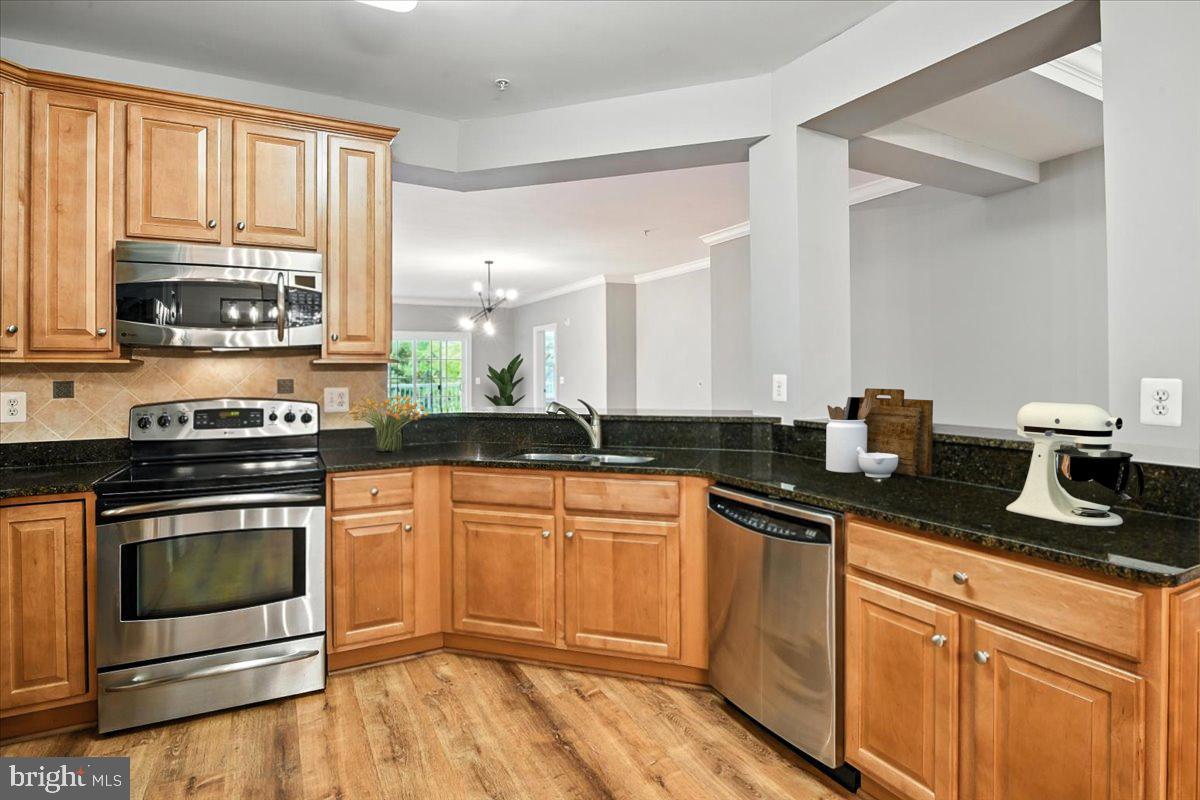 Priced To Sell Fast! Hot Updated Condo, Spacious Kitchen with GRANITE Counters, Stainless Steel Appliances, Tile Backsplash, Spacious Bedrooms, Updated Bathrooms, Hardwood Floors, Walk In Closets, Large Soaking Tub in Master Bathroom, Balcony, Seasonal Water Views of Shoal Creek, Separate Laundry Room with Washer and Dryer in Unit, Water Included in COA Fee, 1 Assigned Parking Space #9, Much More!! Close to Schools, Shopping, Hyatt Chesapeake Bay Resort, Chesapeake Bay Golf Resort, Spa and Marina, Choptank River and Commuter Routes. This Will Not Last!