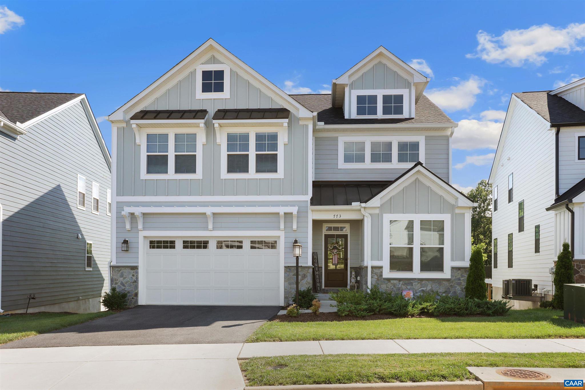Stunning 4-Bedroom, 3.5-Bath Home in Sought-After Crozet, VA! Built in 2022, this beautifully maintained home feels fresh and like new, with abundant natural light and modern design throughout. The open-concept main level features elegant LVP flooring, a spacious living room with a double sided fireplace, and a gourmet kitchen with an eat-in island, walk-in pantry, and dining area that opens to a screened porch overlooking the lush, green backyard. Upstairs, you'll find a versatile two-story loft and four generously sized bedrooms with soft, plush carpeting. The luxurious primary suite includes a spa-like en-suite bathroom with dual vanities, an oversized tile shower, modern finishes, and direct access to the laundry room for ultimate convenience. Quality construction and energy-efficient features include 2x6 exterior walls, R-21 insulation, energy-efficient windows, wood shelving, a tankless water heater, and high-efficiency HVAC. The lower level offers endless potential?ready for your finishing touches and already features a finished bathroom. The plush green yard is tree lined for privacy, and has access to trails perfect for the outdoor enthusiast. Located close to ACAC fitness center & Claudius Crozet park which feature