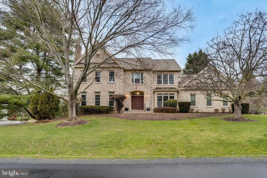 Nestled on a quiet cul-de-sac in Vienna is an elegant executive home with 4008 square feet on a generous .66-acre lot. The carpeted upstairs boasts 5 bedrooms, 3 1/2 bathrooms, including a spacious master suite with an attached sitting room and a second master with an en-suite. Crown molding, high-end finishes, and hardwood floors grace the first floor, featuring a large living room with a gas fireplace, an elegant dining room, and a carpeted study with built-in bookcases. The open-concept design at the back showcases a large, upgraded kitchen with a Wolf stove top set in an island, an Adventism oven suite, a trash compactor, a Bosch refrigerator, and an over sized walk-in pantry. French doors lead to a deck from both the breakfast room and the family room, which includes a gas fireplace and a wet bar. The kitchen connects to a mudroom with a coat closet, a second refrigerator, and a laundry room featuring built-in cabinets and a washer and dryer. The oversize two-car garage comes with a convenient storage or work area. This home offers luxurious living with conveyed amenities such as a glass-enclosed lift, full-house generator, entry cameras, a mailbox sensor, security system, and a programmable sprinkler system. The invisible-fenced backyard with mature landscaping provides a serene outdoor space. The expansive walk-out basement allows for recreation or storage and the potential for additional living areas. In summary, 1602 Fremont Lane combines opulent living, ample space for a growing family, and modern conveniences for comfort and security in Vienna.