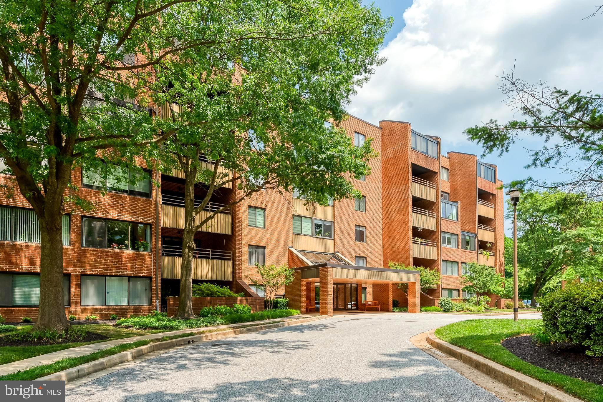 Rare opportunity to own this stunning 1,566 square foot penthouse unit in the private & desirable community of Towsongate! Enter through the elegant foyer into the huge light filled living room which flows easily to the dining area, both complete with floor to ceiling windows, crown molding, recessed lighting , and lovely wood-look luxury vinyl plank flooring. The tastefully updated eat-in kitchen features granite counters & SS appliances. The primary bedroom boasts a dressing area, updated bath, walk-in closet. Guest bath is also updated. Other recent updates include fresh paint, all new windows & screens, custom window treatments in both bedrooms, new heating/AC system, updated electrical, water heater (2025), appliances (2025 stove). Secure elevator building with plenty of parking for residents & guests in front as well as back of building. Experience the convenience of condo living while enjoying nearby shopping, dining, & entertainment! THIS ONE'S A REAL WINNER!