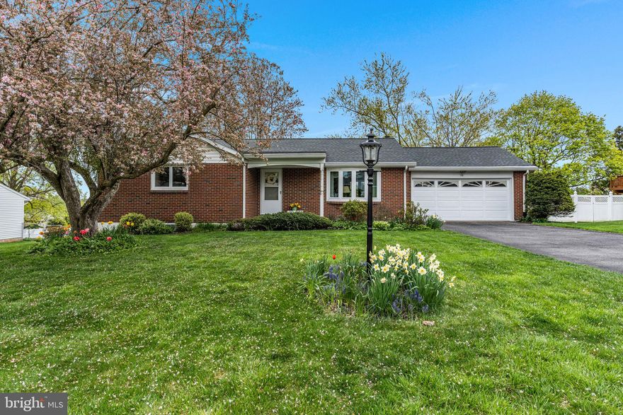 Welcome to this meticulously maintained, original-owner home, situated in a convenient location for PA/MD commuters, & just seconds away from local amenities. Inside, you’ll find a spacious, light filled layout with gleaming hardwood floors and neutral tones, living room with bay window, large country kitchen with upgraded lighting, ample counter space and dining area overlooking the backyard, 3 comfortable bedrooms and full bath on the main level. The finished basement walk out basement provides plenty of space for entertainment and relaxation, with family room, bonus room and half bath. Other notable features include a new roof in 2022, new furnace in 2018, new hot water tank and whole house waterproofing for added peace of mind. Outside, the professionally landscaped lot showcases seasonal blooms and a wondeful level backyard, plus an attached, oversized 2-car garage for ample storage and parking. Don’t miss out on the opportunity to make this meticulously maintained home yours. Schedule your showing today and experience the perfect blend of comfort, convenience, and charm!