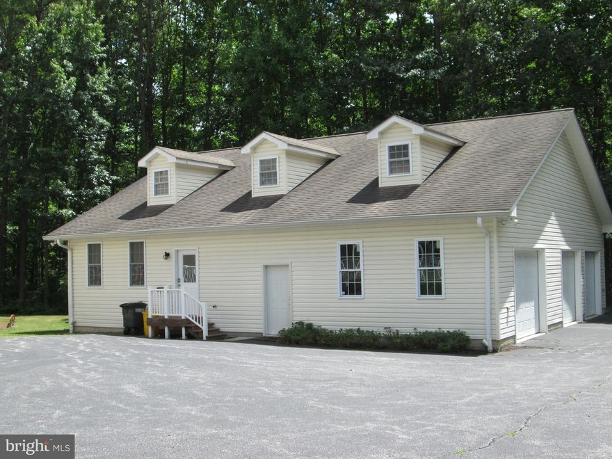 Welcome to this secluded 1 bedroom, 1 bath spacious living area tucked away on a 4.37 acre estate that backs up to a nature preserve. Gas, electric, cable, internet and water are included in the in the rent. 10 minutes to Ft. Meade. Easy access to I97, Rte. 3 and Rte. 32. Fresh paint. New flooring and carpet. Enjoy use of the pool. The apartment is over 850 sq. ft.  with a 22 x 17 living room. There is a utility room w/ washer and dryer. Modern eat-in kitchen and a spacious bedroom with a walk-in closet. You have your own deck for enjoying early morning or early evening. There is 1 garage space and an additional parking space. Tremendous Upstairs stand up attic for storage. Landlord is looking for 700+ credit scores and total income of $90,000+ . Very private.  Come and take a look. You won't be disappointed. No pets. No smokers.