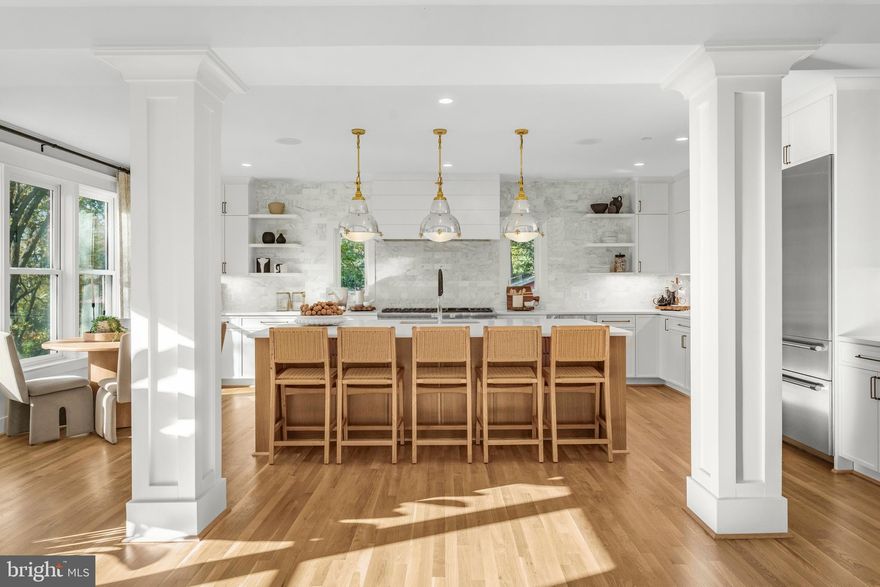 MAJOR RENOVATION & EXPANSION by OPaL - A HISTORIC SINGLE FAMILY HOME in a truly, walkable neighborhood! - Great eateries like Et Viola & Bistro Aracosia (walking there is easy, getting a table will be the tough part), wine shops, parks and some of the best schools in DC! Plus the C&O Towpath and Fletcher’s Cove River Access is an easy walk too. Your new home also has seasonal river views from select rooms.
Our 5200sf historic renovation & expansion is a seamless combination of old and new. Enter the home by way of a covered front porch (you can even watch the Palisades 4th of July Parade from right here). The home has 5 complete bedroom suites, a unique and thoughtful main level with the original wood burning fireplace and glass cabinets; the kitchen takes up the entire new addition on this level with an All Pro Thermador appliance package, custom cabinets and large walk-in pantry. On the lower level you'll find a rec-room, mud-room with new school lockers (cubbies are so 2019), a 5th br suite and large storage room. Laundry and a Work-From-Home loft are found on the bedroom level along with 3 bedroom suites. The loft level has the 5th bedroom suite and a second Work-From-Home loft or this could be a great play-room or exercise space. Garage parking and additional surface parking plus fully landscaped and fence yard.