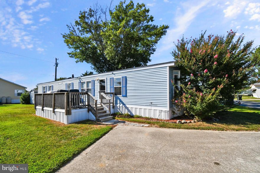 Welcome to 21788 C St in Rehoboth Bay! Located in a vibrant waterfront community, this 2-bedroom, 2-bath manufactured home offers comfort, convenience, and a true coastal lifestyle.
Step inside to find a spacious living area, a well-equipped kitchen and dining space, and the convenience of in-unit laundry. The primary suite features its own full bath with a double vanity and walk-in shower, while the second bedroom and bath provide plenty of space for family or guests. A front deck extends your living space outdoors, perfect for enjoying summer evenings and salty breezes.
Rehoboth Bay Manufactured Home Park is one of the area’s most desirable waterfront communities, offering outstanding amenities including an outdoor pool, private beach, pier/dock access, tennis and basketball courts, an outdoor cardio gym, and a playground. Whether you’re looking for a year-round residence or a vacation getaway, you’ll love being just minutes from Rehoboth Beach Country Club, Dewey Beach, entertainment, shopping and more!
This home is your chance to experience the perfect blend of comfort, community, and coastal charm. Schedule your private tour today!