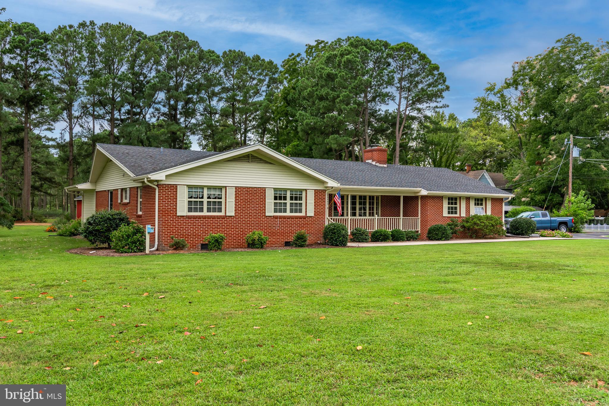 Looking for a minimal maintenance home with all the bells and whistles? Brick rancher on 2.93 acres has been updated in all the best ways, completely remodeled kitchen, family room, dining room, primary bath and utility area. Encapsulated crawl space eliminates moisture related problems, limits allergens, and helps with heating and cooling bills. Roof, gutters and fascia were replaced in 2018 and 2017. Gorgeous kitchen with granite counters, wine bar, LVP flooring, stainless appliances. Primary bedroom has two walk in closets and another closet, double doors open to ensuite bathroom with deep soaking tub, walk in shower, quartz countertops. Large formal living room with fireplace for entertaining, family room also has wood burning fireplace, both have been cleaned, and are ready for a cozy fire! Single car garage has work bench and freezer. Landscaped and manicured lawn with patio overlooking back yard. Separate lot included in 2.93 acreage could be a building site. Don't forget the three season porch at the rear for your morning coffee!
