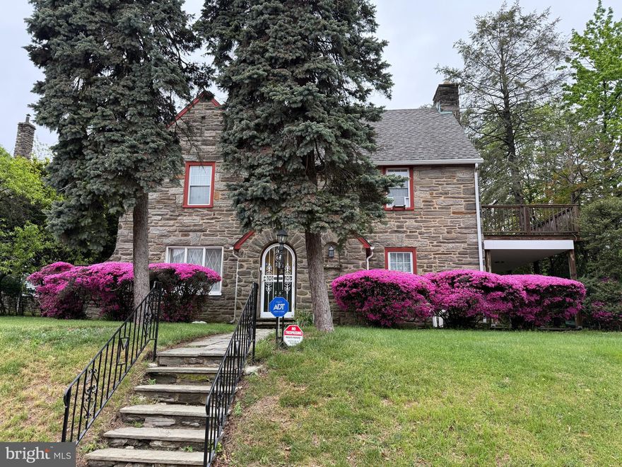Discover the perfect blend of character and comfort in this stunning East Oak Lane stone home. Boasting 5 bedrooms and 4 full baths, this residence has been thoughtfully updated for modern living. You’ll love the flow of the main floor—from the cozy den/library to the brand-new kitchen equipped with gas cooking and granite finishes. The second floor is a dream for families, featuring two private ensuites and two bedrooms sharing a Jack and Jill bath. Don’t miss the charming top-floor suite or the partially finished walk out lower level.   Outside, enjoy mornings on the covered side porch or summer BBQs on the massive rear patio. With a private drive and garage, this is the turnkey gem you’ve been waiting for.