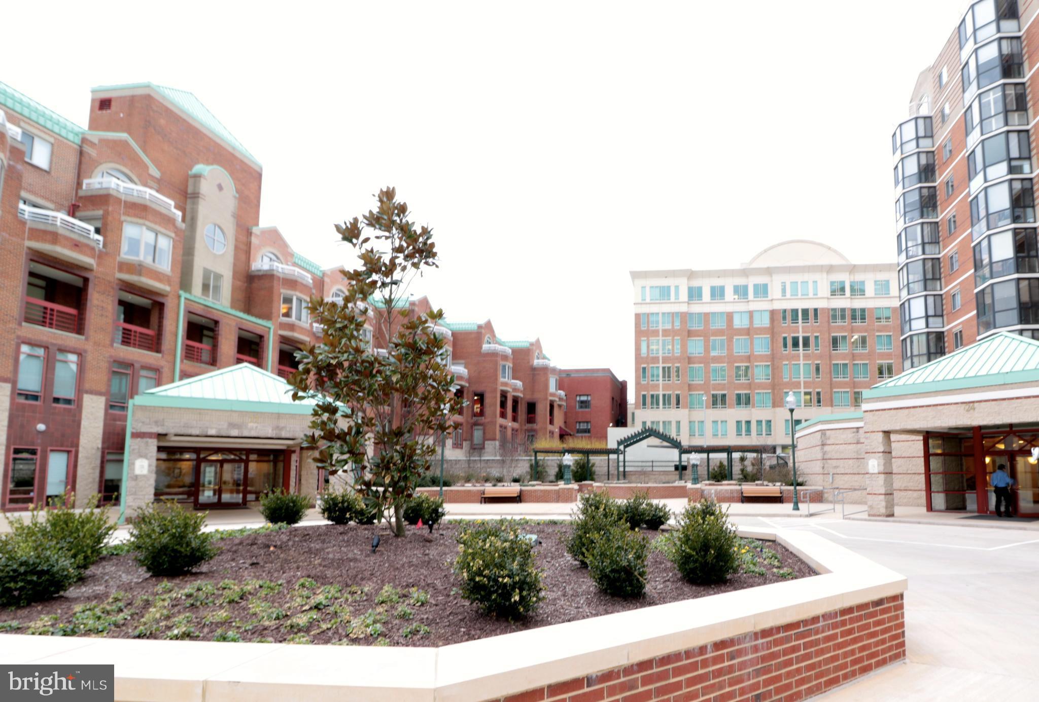 Fabulous 1BD/1BA condo in the secure, elevator building. Unit features awesome glass enclosed sunroom with views of Downtown Rockville Town Center!! Beautiful Hardwood Flooring, W&D in the unit, Additional Storage and 24 hour Security. Minutes to Rockville METRO bridge, movie theatre, shopping and TONS of restaurants. Condo Fees, Water & Trash Removal included. Assigned 1 Garage Parking Space