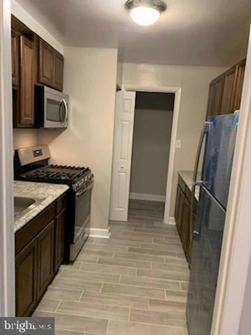 Welcome to 3823 Saint Barnabas Road T2 - your new spacious home. The unit was upgraded in 2021 with new kitchen cabinets and appliances, carpet, and ceramic tile in the kitchen, dining room, and hall near front entrance. The unit has lots of inside storage and there is additional storage on the patio and a designated storage space in the laundry room inside of the building. Condo can be accessed from inside of the building and it has direct access from the outside where there is a private patio. There are unassigned parking spaces near the patio entrance. Water and gas are covered by the condo fees. Your new home is in close proximity to restaurants, shopping, public transportation, recreational areas, and much more!