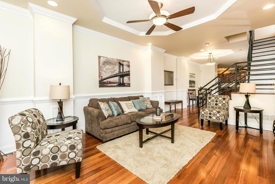 Stunning EOG in Patterson Park! This gorgeous sunlit home has a open floor plan w/ high ceilings, sep dining space, HW floors & finished bsmt. The gourmet kitchen features SS appliances, granite counter tops & cherry cabinets. 2 HUGE master bedrooms w/ en suite baths plus sitting area in MBR. 2nd fl balcony off 2nd BR, plus rear patio perfect for entertaining! Close to Hopkins & Patterson Park!