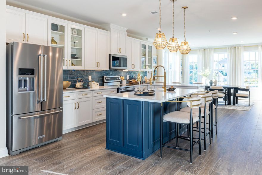 Ready for Immediate Move In!! Find Your New Home Adventure at Gatherings at Lakeview. Whether you want to elevate, downsize, or rightsize your lifestyle, this 55+ community in Reisterstown offers the perfect balance of comfort and convenience. Choose from two stylish condo floorplans and enjoy amenities like a walking trail, fitness stations, pickleball, and more. Join community events at the clubhouse or explore nearby Owings Mills for shopping and dining. At Gatherings at Lakeview, you'll be close to everything that matters most—daily conveniences, top-tier amenities, and cherished connections. Experience effortless living in the two-story elevator included, 3-bedroom Seneca condo, designed for comfort and convenience. The main level features a central kitchen with ample cabinetry, seamlessly flowing into a bright dining area and open great room, creating an airy and inviting space. Take the private elevator upstairs to your luxurious primary suite, complete with a spa-like bath. Two generous secondary bedrooms and a convenient laundry room complete the upper level, offering plenty of space for relaxation and everyday ease. Relax on your private balcony or explore the community’s exceptional amenities, including pickleball, fitness stations, and scenic walking trails around the lake. Enjoy energy savings with our ENERGY STAR® certified and Indoor airPLUS-qualified homes. *Photos are of the model home. *This listing represents the base price for this model on a to-be-built lot in the community. *Pricing, features, and availability are subject to change without notice. MHBR No. 93 2023 Beazer Homes.