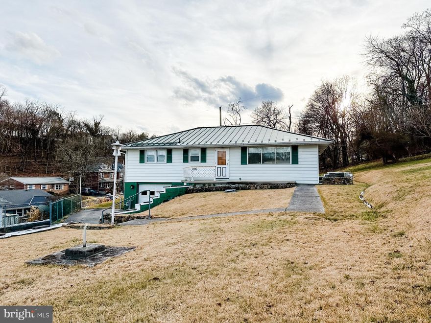 My, my, what a buy!!  This 3 bed/2 bath West Side Rancher is IMPRESSIVE! Spacious rooms, REAL hardwood floors, BIG kitchen with oak cabinets and NEW flooring, freshly painted throughout, Central AC, Gas hot water baseboard heat, one car garage, a full basement, and MORE! Make your appointment today!!