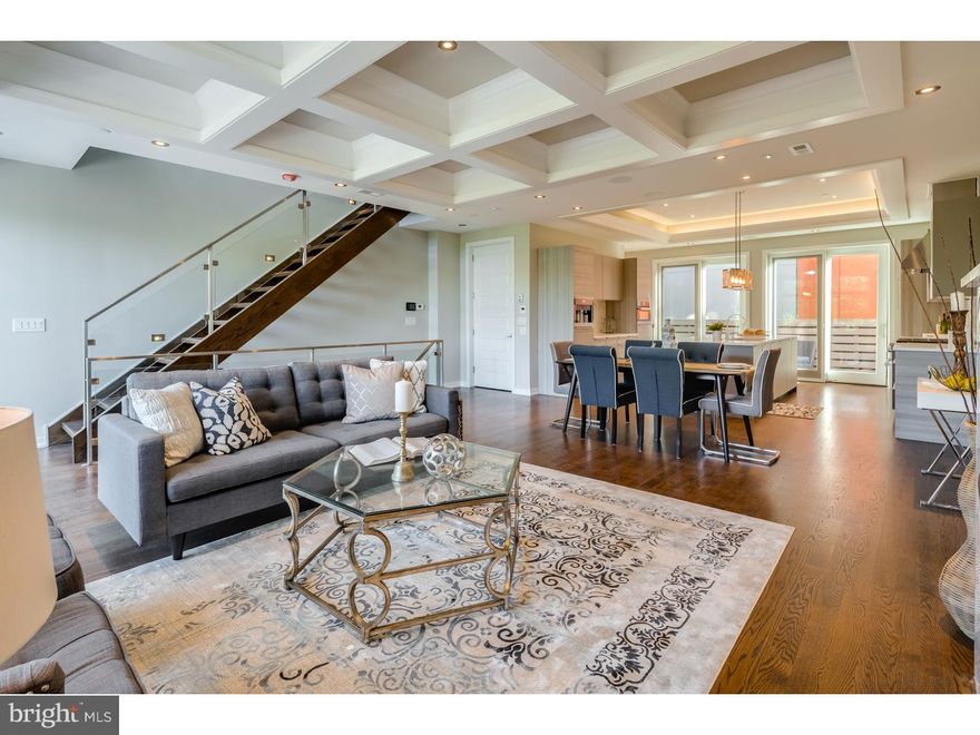 Spectacular new homes with every amenity imaginable at only $342/sf! Riverside Luxury Townhomes have 5,200+ square feet of living space built by a meticulous custom home builder. Features include 2-car garages, approved tax abatement's ($1044 /2016 annual taxes), theater rooms, a 6-stop elevator, 3 zoned HVAC systems, smart home technology systems and 4 outdoor spaces including an amazing roof deck. Each home has 4 to 5 bedroom layouts plus bonus rooms, five full bathrooms, and one half bathroom. The master bedroom suites occupy an entire floor of each home and are to die for!  The master baths are enormous with designer oval soaking tubs, open tiled European shower rooms, perfect tile choices and dual vanities crafted by Porcelanosa. The master bedroom levels also have two walk in closets with custom shelving and large sun-drenched sleeping areas with over-sized windows. The kitchen is a true masterpiece with Poggen Pohl cabinetry, Silestone counters, top of the line Miele appliances and a huge island for entertaining and dining. These homes are an example of expert old world craftsmanship that is difficult to replicate, with accent lighted crown moldings in the kitchens and coffered ceilings in the living areas. The living rooms also have gas fireplaces, several floor to ceiling windows, elegant hardwood floors and designer wood staircases with iron and glass railing system right out of Architectural Digest magazine. Too much to mention in one short summary!! The lower levels are accentuated by theater rooms, a full bathroom and home gym. The smart home system includes a security alarm, video intercom system and a home automation system. Each bedroom is spacious and has large closets and tons of natural light. Every bathroom is unique with designer fixtures and perfect tilework. The craftsmanship in these homes is stunning. The roof decks are over 60 feet high and have unobstructed views of the Delaware River and Ben Franklin Bridge to the East and of the city's amazing skyline to the West. These enormous roof decks are properly supported to hold a full size hot tub, and are equipped with gas lines, electric and running water. Riverside Luxury Townhomes are located in Philadelphia's most historic neighborhood. Walk the cobblestone streets to some of the city's best restaurants and boutiques. The homes are bordered by a park and have easy access to major thoroughfares.