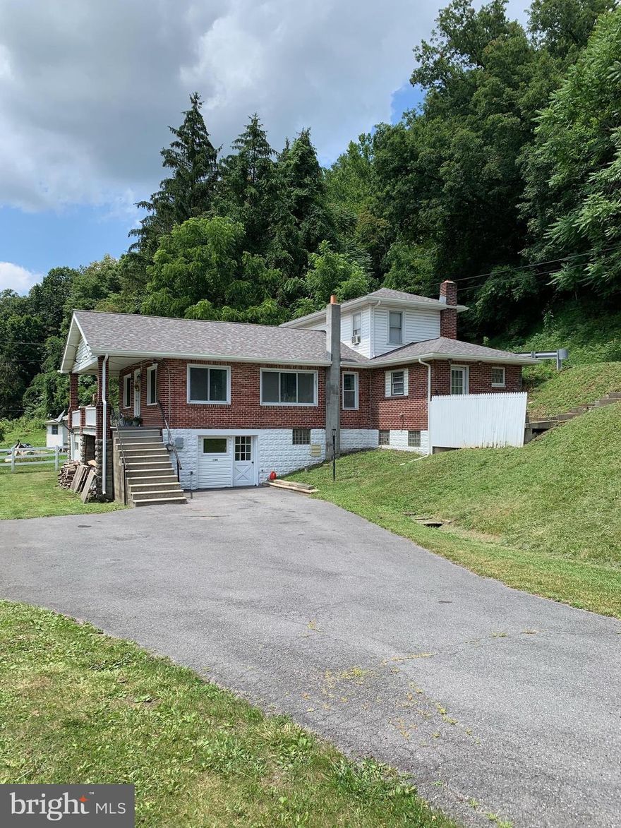 Move right into this updated home!  The work is done: roof and gutters in  2021, coal furnace 2020, updated flooring 2020 , fresh paint and an updated kitchen and with two heat sources you can pick the most economical resource.  Make your appointment today to see this lovely three bedroom home and start packing your things.