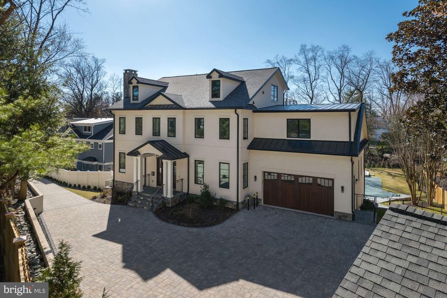 Exquisite brand-new construction in sought-after Kent by AR Custom Builders. Not a single detail overlooked by master craftsman. Approximately 8,000 sq ft over 4 levels with elevator, pool and rare roof deck with stunning treetop views. Massive lot tucked away gives ultimate privacy. 2 separate garages provide 4 car parking with more space in driveway. Walk to amenities of MacArthur Blvd.