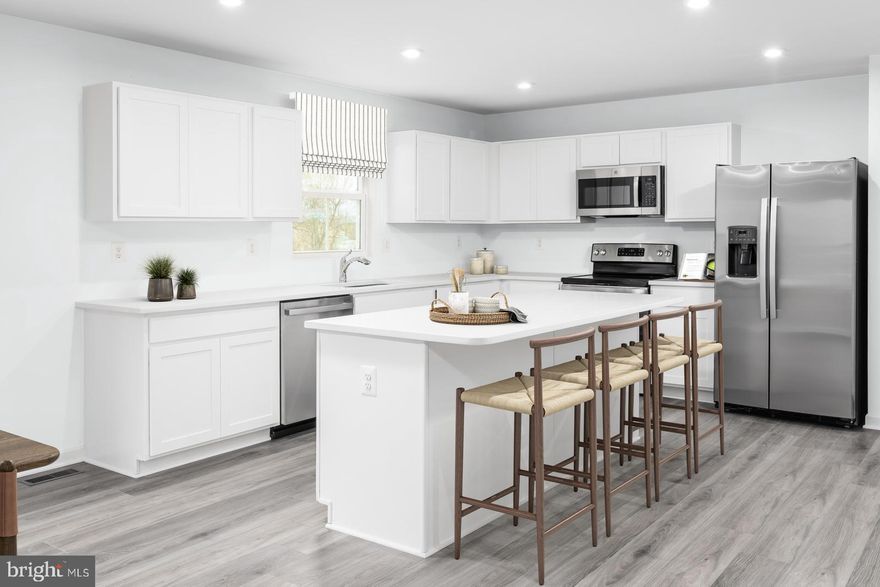 This to-be-built Hazel at the brand new OAK LEAF MEADOWS community! This home features a spacious backyard, brand new kitchen appliances, a new home warranty, and more! Welcome home to The Hazel- 2 ,540 finished square feet! This 5+ bedroom, 3 full bathroom, 2-car garage single-family home is highlighted by a main level bedroom and a large great room adjoining a gourmet kitchen with an island overlooking the dining area. Just off the 2 car garage, a first-floor full bedroom and bathroom offers privacy and comfortability. At the front of the home, your flex room makes an ideal formal dining room, office, or play space. Upstairs, three bedrooms feature a walk-in closet, share a hall bath, and lead to a 2nd floor loft, perfect for extra entertaining space! Your luxury owner’s suite includes a dual-vanity bath and TWO walk-in closets! Optional basements available depending on homesite.
Explore Oak Leaf Meadows today - Musselman school district, 5 minutes to I-81, 15 minutes to Martinsburg and 20 minutes to Winchester. Closing Assistance Available with Use of Sellers Preferred Lender! Lot premiums may apply. Other floorplans and homesites are available. Photos are representative. Come and visit the model at: 186 Inola Court, Inwood, WV 25428