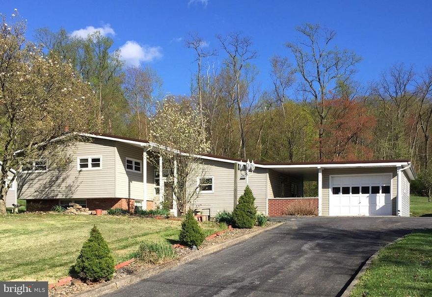 Beautiful multi-level on .46 acre lot in convenient location. This move in ready home features 3 bedrooms, 2 full baths, finished rec room in walk out basement and 1 car garage. Some of the many updates include a kitchen and bath remodel, replacement windows, metal roof, vinyl siding and natural gas furnace.