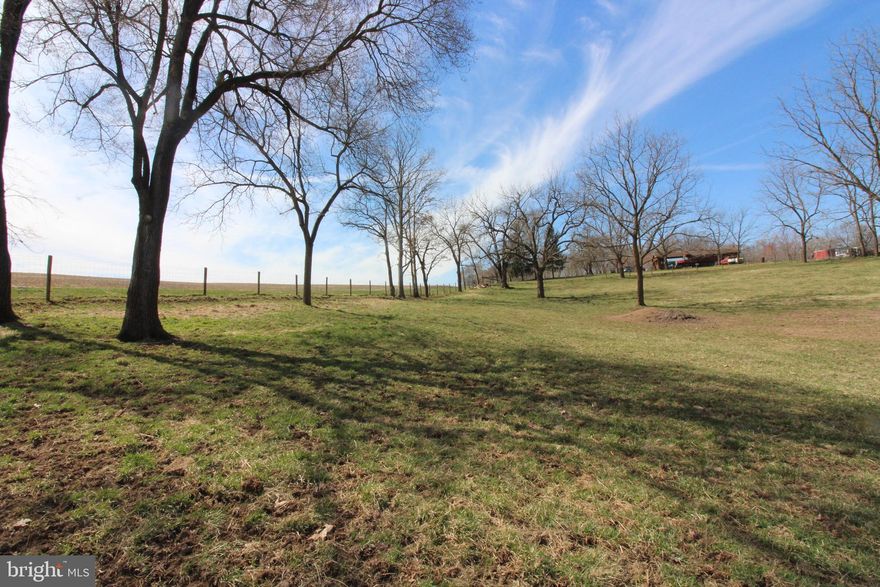 Great  location for your dream home.  Unrestricted land.  Approved for a 3 bedroom conventional perk.