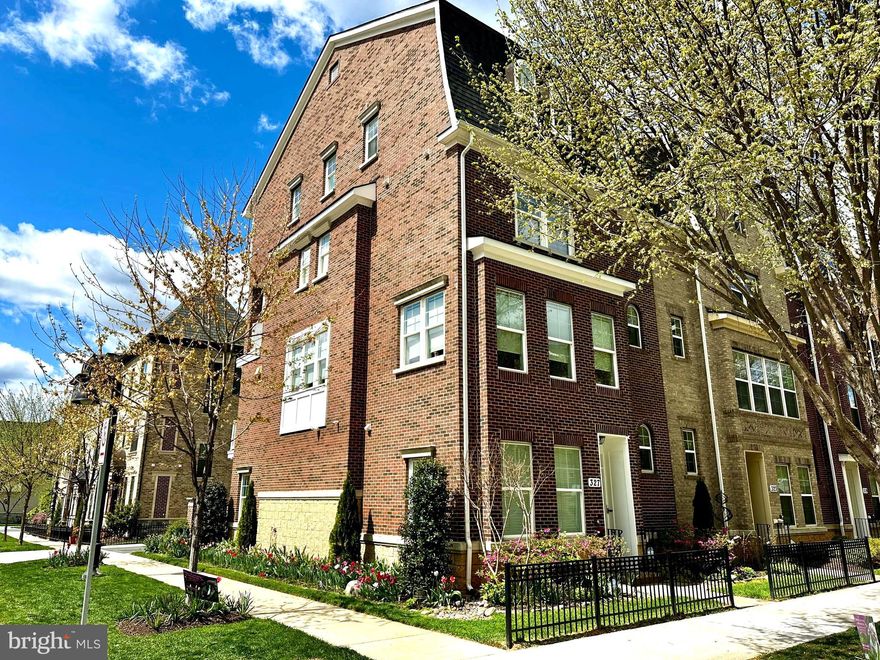 Rare Opportunity: Stunning 4-Level End-Unit Townhome with Elevator in Downtown Crown
Welcome to one of the most desirable homes in Crown, Montgomery County’s vibrant mixed-use community. This elegantly finished 4-level M/I built Midori end-unit offers luxury, sun soaked living in the heart of it all—complete with a private elevator, top-tier upgrades, and an unbeatable walkable location just 100 yards from Downtown Crown's bustling shops and restaurants.

Features You’ll Love:
* 3–4 Bedrooms | 4.5 Bathrooms | Elevator | 2-Car Garage
* Spacious open-concept layout with wide plank hardwood floors throughout the main level and is sun drenched!
* Gourmet kitchen with granite countertops, stainless steel appliances, tile backsplash, oversized island with seating, and a walk-in pantry
* Inviting great room featuring a striking stacked stone gas fireplace
* Beautiful Trex deck perfect for entertaining, complete with a fully automatic retractable awning and stunning sunset views.
* Flexible lower-level space with a full bath—ideal for a home office, or fourth bedroom.
* Luxurious third-level owner’s suite with a spacious layout, sitting/workout area, custom walk-in closet, private balcony, and spa-inspired bathroom with soaking tub, dual vanities, and glass walk-in shower
* Private Elevator to all 4 floors!
* Top-floor bonus/media room, plus two additional bedrooms, each with en-suite baths.
* Garage upgrades include a custom polyurea floor coating and StoreWall adjustable shelving
* Over $50K in custom window treatments throughout the home (Motorized).

Crown Community Amenities:
Living in Crown means having everything you need just steps from your front door. From casual restaurants to fine dining, gyms to luxury spas, coffee shops, banks, and boutiques, it’s all here. And perhaps the biggest convenience of all: Harris Teeter grocery store is just a short walk away.
Residents also enjoy access to "The Retreat," Crown’s exclusive community clubhouse, featuring a resort-style pool, fitness center, yoga studio, lounge areas, and event space. With low HOA fees that include lawn and community maintenance, plus a shuttle to the Metro, every detail has been thoughtfully designed for effortless living.
Located just 2 minutes from RIO, I-270, and the ICC, this is the perfect place to call home.

Luxury, convenience, and community—this is Crown living at its best. Schedule your showing today.