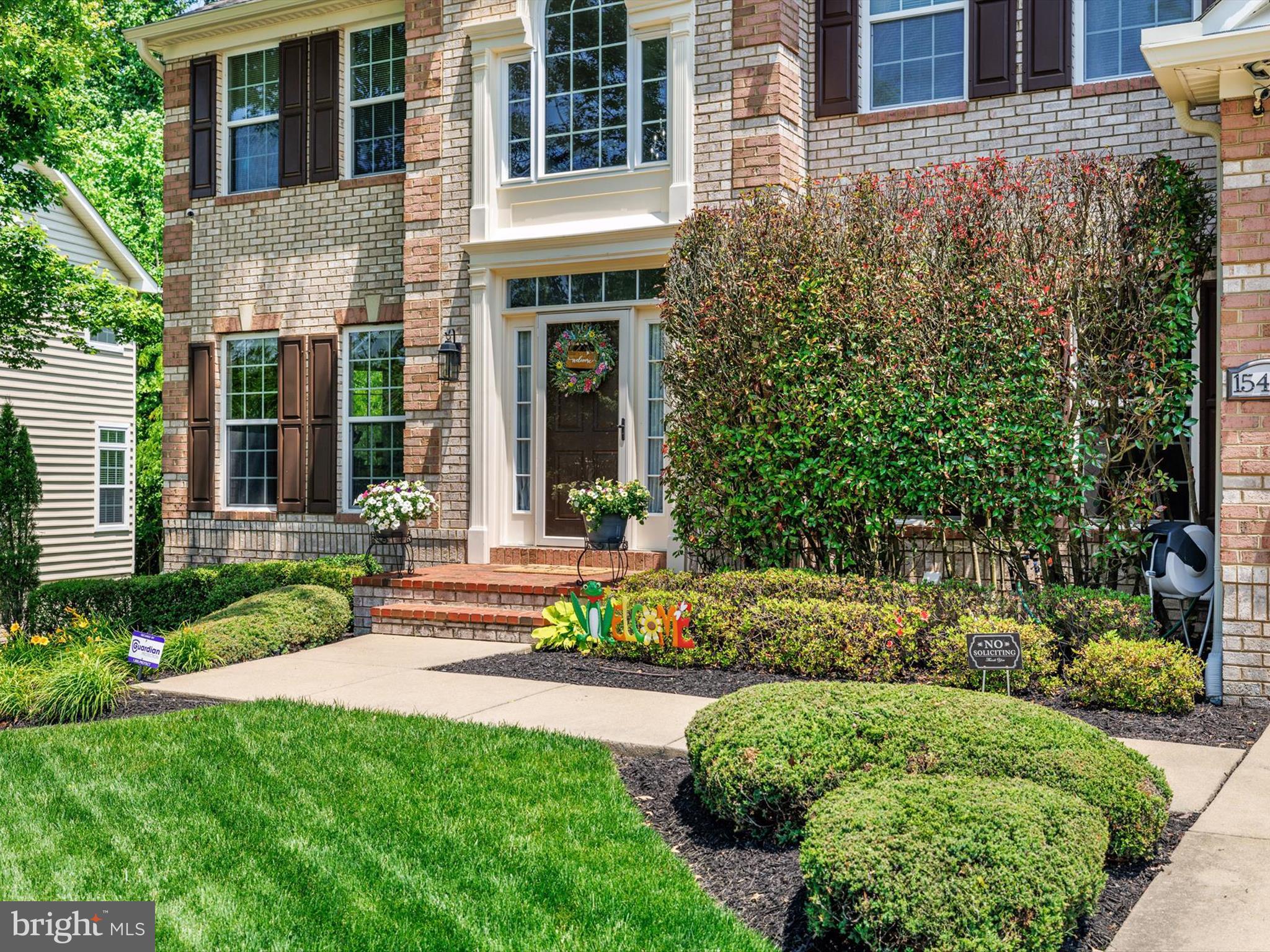 PRICE IMPROVEMENT - Welcome to 15446 Symondsbury Way — a stunning 4-bedroom, 3.5-bath residence nestled in the highly sought-after BeechTree and Lake Presidential Golf Course community. This exceptional Courtland model was built with luxurious 4-foot extensions, offers over 4,275 sq. ft. above grade of beautifully appointed living space, plus a fully finished basement.
Soaring cathedral ceilings and elegant tray ceilings grace the formal dining and primary suite, while rich hardwood floors flow through the formal living room, dining room, and study. The gourmet kitchen boasts 42-inch cabinets, an oversized granite island, and custom glass-front cabinetry, opening into an extended morning room with serene wooded views. The main level also houses the first of two laundry areas.
Enjoy the added space from multiple bump-outs extending across all floors, enhancing the foyer, morning room, and family room. The luxurious primary suite features a private sitting room/office, a lighted tray ceiling, and a spa-like bath with a jacuzzi tub. Additional features include ceramic tile flooring in the foyer, kitchen, and morning room, and bay windows that flood the home with natural light. A bonus of
extra insulation in walls and ceilings saves on utility costs.
The expansive basement is a true highlight, featuring a wet bar with dishwasher and refrigerator, a fully equipped gym, a large laundry room with slop sink and cabinetry, An additional workshop/storage area, a finished under-stairs storage nook, and brand new carpet and paint.
Step outside to a beautifully designed Trex deck with RainEscape underlayment (2022), creating usable dry space below, along with dual patios (2020) perfect for entertaining. The home backs to tranquil woods and walking trails, offering unmatched privacy and tranquility.
Exceptional upgrades include:
• New 6-inch gutters, downspouts, ridge vents, and roof seals (May 2024)
• New 5-ton AC unit and furnace (May 2024)
• New 75-gallon gas water heater (Jan 2025)
• Guardian security system with full camera setup, Ring doorbell, and solar-powered front/rear cameras
• Motion-activated lights front, side and rear
• Lawn irrigation and sprinkler system
• Extended garage with added cabinetry, folding attic staircase, flooring, and insulation
This extraordinary, sun-drenched home combines elegance, functionality, and comfort in one of Prince George’s County's premier communities. Don’t miss your chance to own a true gem in BeechTree.