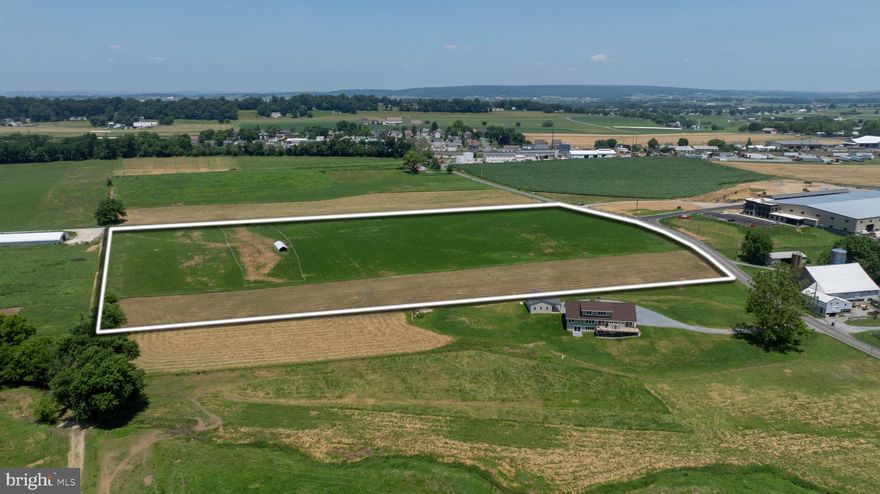 11± Acre Prime Commercial/Industrial Lot
Fantastic development opportunity with potential to subdivide into two lots. Ideal for commercial or industrial use!