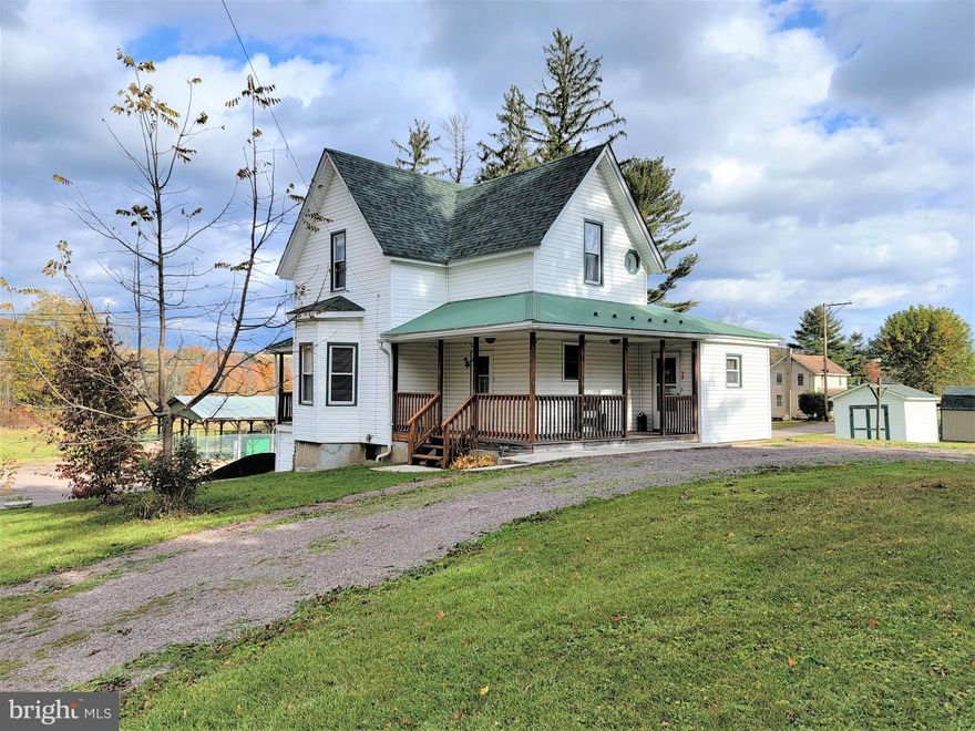 Located on a corner lot on the outskirts of town, this 3 bedroom home features a spacious kitchen, a generously-sized living room and a large dining/family room.  This home has been updated with a newer roof and replacement windows.  If you're wanting to relax, there is a front porch, a rear porch and ample space in the back yard.  The storage shed in the back yard is also included.