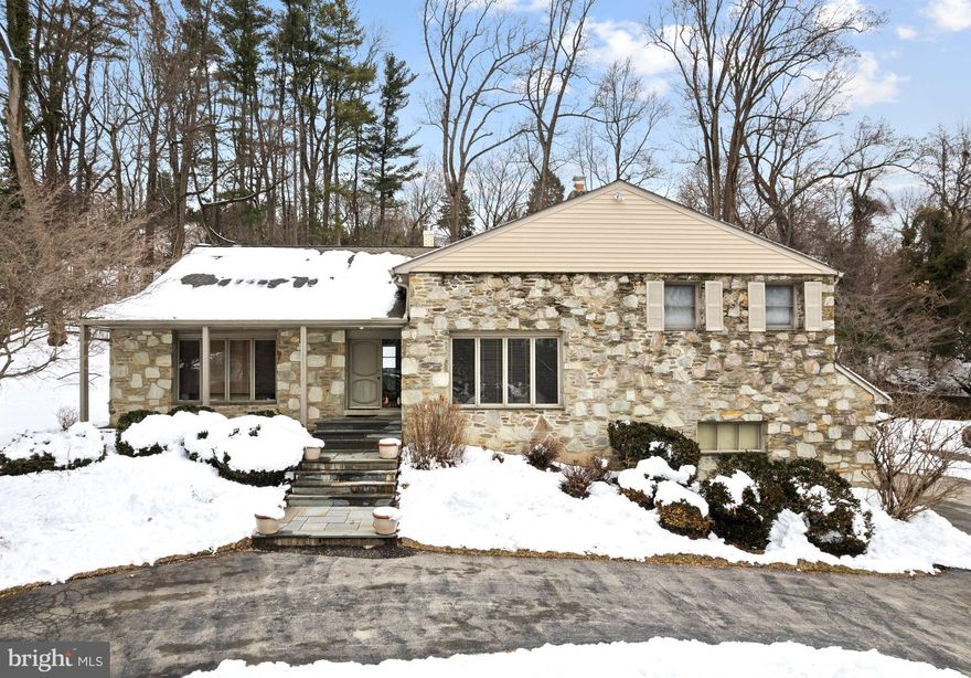 Have you been waiting for a Mid-Century Modern residence to make your own? This rarely offered Penn Valley home has only had 2 owners and is waiting for its next steward. Situated on a highly desirable cul-de-sac, an acre of green, and private grounds with all utility lines buried underground. This 5-bedroom, 4-bath home delivers approximately 4,300 sq ft of expansive living space, balancing classic modern design with modern comfort, also featuring indoor/outdoor living with an in-ground pool. Additionally, more unfinished square footage for storage or other uses. Move-in ready yet primed for taking this space to the next level.

Finishes include: Abundant sunlight from many windows, large vestibule for greeting guests, elegant slate floors in the vestibule & the dining room,  ¾ inch oak hardwood floors throughout (some under the carpeting), and custom built-ins setting a sophisticated tone, vaulted or high ceilings & a floor plan integrating indoor and outdoor living and archetypal bifurcated floor plan of the era with a switch back stair design for easier living.

Enter the bright, center hall vestibule flanked with a Sitting/TV room to the right and a bright, large Living Room to the left, and a large double-wide coat closet (think mud room behind closed doors). The SITTING ROOM is bright with a 10-foot ceiling and features an impressive wood-burning fireplace with stone from floor to ceiling. Custom cabinetry is ideal for displaying art, books, and a space for a large television. The LIVING ROOM offers a wide bay window flooding the space with light, large enough to fit a grand piano and entertaining numerous guests. Proceeding to the expansive DINING ROOM, including custom wood cabinetry, slate floors, and ample space for a 10–12-person dining room table. Pass through aset of pocket doors to the eat-in KITCHEN, a large sun-drenched space (2 large skylights) with modern white cabinetry, granite counters, some newer stainless-steel appliances, tiled backsplash, engineered wood floors, ample room for multiple cooks, and a new glass sliding door to the patio; this is the hub of the home. Behind another pocket door is a large pantry and the laundry room with its own exterior access, perfect for managing the chaos of summertime fun in the pool!

The Primary Suite & Private Bath & two large bedrooms sharing a full bath. Walking up the stairs, the first bedroom is the PRIMARY SUITE, large, measuring at 20’ x 26 feet. Four windows fill the space with light, with two sets of closets (A walk-in and a double closet). The PRIMARY BATH features separate double vanities with ample storage, a Kohler jacuzzi tub, walk in shower, and private water closet. ADDITIONAL BEDROOMS are bright with large closets and a shared 3-piece HALL BATH with double vanity.

THIRD FLOOR:: is dedicated to the 4th BEDROOM, nearly equal in size to the primary bedroom. Its distinctive features are the vaulted ceiling, private bath, and walk-in closet. Depending on your needs, this space is versatile, a shared child’s bedroom, guest suite, Studio, workout room, or hobby room, all up to you.

The lower level is a true showpiece — a private guest bedroom or home office, half bath, and a full bath with direct pool access create a self-contained entertaining haven. All anchored by an original wood ribbed wall and a vintage1967 Revere Ware copper fireplace, a rare collector's piece that is as visually striking as it is historically unique, finished off by an original curved bar right out of an episode of Mad Men.

Brand-new roof with new skylights and chimney cap, dual-zone HVAC, 200-amp electrical plus sub-panel, French drains+ sump pump system, grounds run-off water management systems. In the award-winning Lower Merion School District, minutes to Narberth, Ardmore, and 20 minutes to Center City via SEPTA. Rare opportunity for a Mid-Century home of this magnitude with the proximity to Center City and surrounding suburbs.