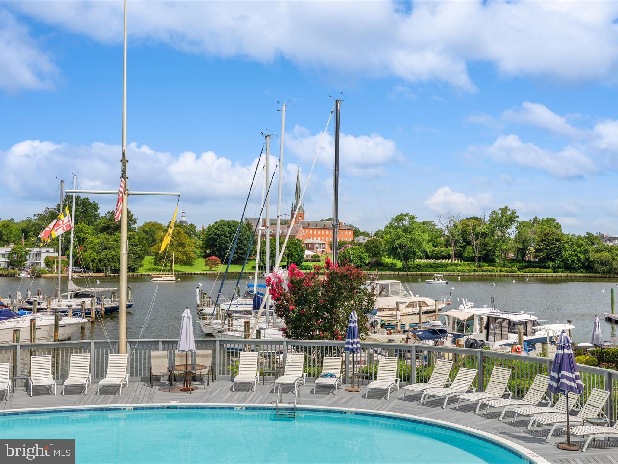 REDUCED AND PRICED TO SELL! STEP INTO LUXURY AT THE YACHT CLUB CONDOMINIUMS OVERLOOKING BEAUTIFUL SPA CREEK AND THE GORGEOUS GROUNDS OF ST MARYS CATHEDRAL. This 1 Bedroom, 1 Bath Condo boasts Stainless Steel Appliances, a Wood Burning Fireplace and spectacular views from your private deck. Enjoy the ultimate Annapolis Lifestyle where you can dine dockside, paddleboard at sunrise, take a dip in the waterside pool or catch the water taxi to downtown Annapolis. Step inside to this immaculate unit and call it home. The Community Amenities elevate the experience with a clubroom, fitness area with shower facilities, waterside pool, grilling area, deep water marina access, assigned parking, laundry area, secure storage area and pet-friendly! This unit is being sold furnished, don't wait, schedule your tour today! Condo bylaws require a 15 day right of refusal before settlement. Possibility of buying a boat slip directly out front at marina. This complex allows long and short term rentals.