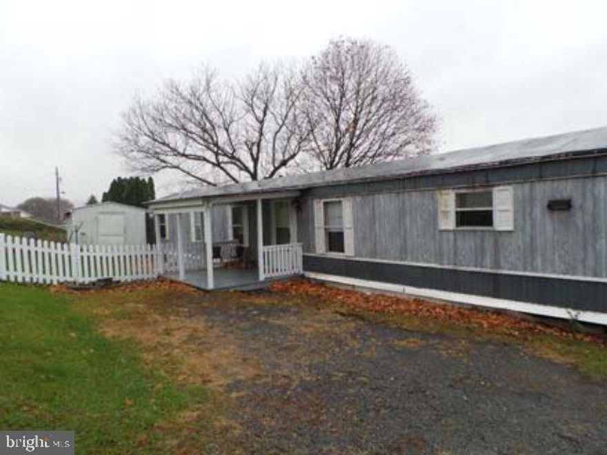 Single wide 14x67; 3 Bed; 1 Bath; Spacious kitchen & living room areas.  Affordable living, walking disance to store, bank, post office, Lions den, school, restaurants, and more. Detached storage shed (8x11). $225 Lot rent.