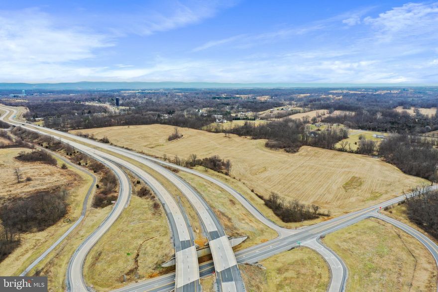 Amazing location directly between Martinsburg and Charles Town along Route 9 at the Leetown Rd/Shepherdstown Exit Ramp.  This 37.16 Acres is 3 separate lots and could be three separate minor subdivisions within Jefferson County Code.  Please consult Planning and Zoning for more info.  Currently zoned agricultural, but with this location, highest and best use could be commercial, residential, industrial, or a mix.  Visibility is strong from both directions along Route 9 and interchange is a 4 way featuring an easy on and easy off.  Lot lines can be changed through staff at Planning and Zoning as needed.  Again, please consult Planning and Zoning Department directly for more information.