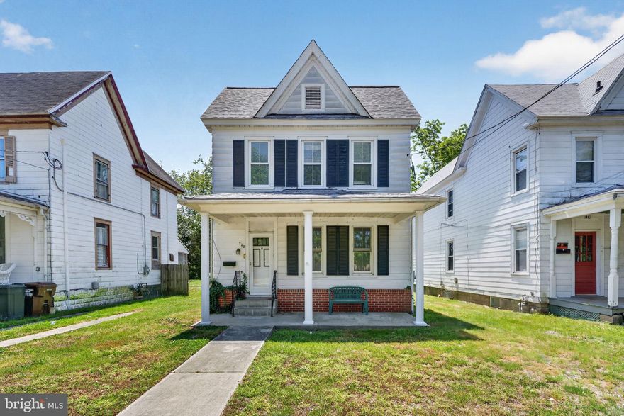 This 1,592 sq ft two-story home in the heart of Cambridge checks every box: space, character, location, and real upside for whoever gets here first. Pull up and you're greeted by a covered front porch. Cambridge has a walkable, tight-knit downtown energy, and this porch puts you right in the middle of it. Wave to the neighbors, sip your morning coffee, or just enjoy the fact that you're steps from local restaurants and shops without the noise being in your backyard. Inside, the first floor opens up with a family room centered around a fireplace- a natural gathering spot with large windows flooding the space with light. Down the hall, a formal dining room with built-in shelving. The kitchen is spacious with plenty of cabinetry, and there's a dedicated laundry room with a washer and dryer plus a full bath rounding out the main level. Head upstairs and you'll find three generously sized bedrooms- each with original hardwood floors, crown-molded windows, and additional built-in cabinetry that adds storage without sacrificing charm. The natural light up here is something you notice immediately. Out back, a private rear yard with a storage shed gives you breathing room- garden, store, or just have a little outdoor space to call yours on a 0.1-acre lot. Whether you're planting roots or building a portfolio, 722 Glasgow is it.