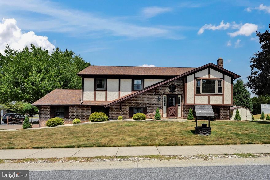 Bi-level on a corner lot in desirable Lincoln Gardens neighborhood. This home features 2 bedrooms on the main floor two full baths, living room, kitchen with open dining room, and sliding doors that lead out to a nice sized deck. The lower level is equipped with a kitchen/dining/living room combo space, a bedroom and full bath. This would ideally serve the purpose for an in-law quarters or family. The attached two car garage contains the laundry and extra storage space above. The original building plans featured 3 bedrooms on main level. Currently consisting of two large bedrooms, the potential exists to convert back to three. Call to schedule your private showing today!