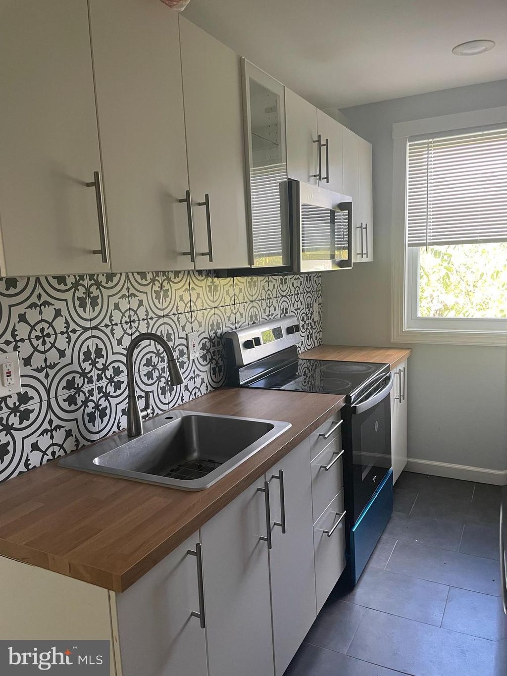 Photo of 512 Ridge Road SE #305, WASHINGTON, DC 20019 (MLS # DCDC2222522)