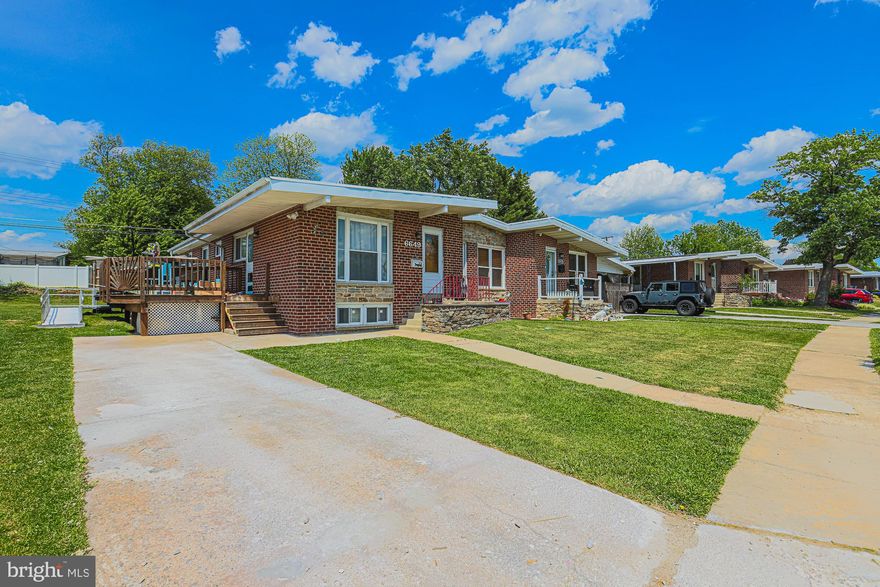 Welcome to this bright 3/4 bedroom 2/1 bath brick semi rancher situated on beautiful lot.  Kitchen with many updated that include- new dishwashers, stove with dual oven, range hood, stainless steel refrigerator, custom Acacia/butcher block  wood countertops,  granite prep area, wood deck with handicap accessibility, hardwood floors throughout, dining room with built ins and vaulted ceilings, new furnace (2025), upgraded electrical exterior service cable,  cable ready,  finished lower level with new vertical washer/dryer, bedroom with outside entrance, full bath and extra office/rec room.