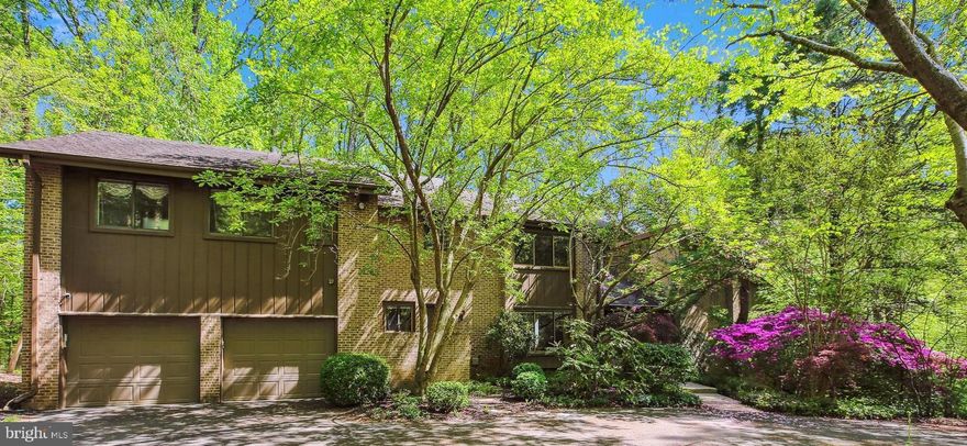 YOU CANNOT KNOW THE UNBELIEVABLE SPACE, LIGHT, AND POSSIBILITIES OF THIS HOME WITHOUT BEING INSIDE! TELL YOUR REALTOR TO SCHEDULE YOUR APPOINTMENT TO SEE IT TODAY!  ........... See This Beautiful Home and Property Again! Motivated Seller! SET ON 1.2 PEACEFUL ACRES in the heart of Potomac, this custom contemporary home by famed builder/architect Jack Greenspan features 8,500+ SF of interior space (7,155 FINISHED SF) and sits on a private cul-de-sac. With close proximity to Potomac Village and a short distance to Wayside Elementary School and Country Glen Swim and Tennis Club, the location is perfection!.  .  .  .  .  .  .  .  .  .  .  .  . A CIRCULAR DRIVEWAY with flowering plants and trees welcomes you home to a spacious interior with three fully finished levels. Vaulted ceilings and light, bright interiors are featured throughout a contemporary open floor plan.  .  .  .  .  .  .  .  .  .  .  . THIS HOME'S ORIGINAL OWNERS have taken good care of the property with updates throughout their ownership. This property boasts an amazing floor plan with a main level primary suite and zoned HVAC. With an excellent Glen Mill Village address, a gorgeous private setting with parkland views and ample room for both entertaining and everyday living; this Potomac gem combines comfort and convenience for the next owners.  .  .  .  .  .  .  .  .  .  .  . MAIN LEVEL:  
NATURAL LIGHT floods the main-level living spaces. Enter the home through large double doors into a vaulted ceiling foyer which showcases a floating staircase. In the oversized family room there is plenty of space to relax and entertain. Double sliding glass doors provide access to the back deck and views of the gorgeous wooded back yard.  .  .  .  .  .  .  .  .  .  .  .  . THE KITCHEN FEATURES granite countertops, an island with breakfast bar and room for a large dining table. A large separate refrigerator and freezer, wet bar with ice machine, and glass sliders to a screened-in porch complete the gathering space.  .  .  .  .  .  .  .  .  .  .  .  .
A HALLWAY OFF THE FOYER leads past the powder room to the main-level primary suite. This includes an oversized bedroom with sliding doors to the deck, fireplace, three large walk-in closets, a bonus room with a window that can be used as a private office or nursery; and a private bath with a double vanity, large tub, and separate custom shower.  .  .  .  .  .  .  .  .  .  .  .  . A LARGE LAUNDRY ROOM with a half-bath, oversized closets, a utility sink; a mud room with more storage; and access to the attached, 2-car garage round out the main level.  .  .  .  .  .  .  .  .  .  .  .  .  .  .  . UPPER LEVEL:  LARGE UPPER-LEVEL HALLWAY accesses four spacious rooms, all with generous walk-in closets and windows overlooking trees and parkland. Two full bathrooms connect the bedrooms.  .  .  .  .  .  .  .  .  .  .  .  .  .  .  .  . LOWER LEVEL: THE EXPANSIVE BASEMENT is finished with carpet throughout and offers an open recreation room with natural light and walk out sliding glass doors. A sixth bedroom with a full window and closet, a full bath, and multiple oversized storage rooms are also part of the full-size lower level.  .  .  .  .  .  .  .  .  .  .  .  .  . SPECIAL FEATURES:
Floor-to-ceiling windows .  .  .  .  .  .  .  .  . Recessed lights throughout .  .  .  .  .  .  .  .  .  . New carpet along stairs and upstairs hallway .  .  .  .  .  .  .  .  .   . Triple heating & cooling zones, which allow for comfortable living and sleeping .  .  .  . .  .  .  .  .  .  . Large beautifully designed and built brick 6 BR home - Large over 1 Acre cul-de-sac lot surrounded by parkland - Just 2 miles to Potomac Village - just 2 miles to Cabin John Village. This is your quiet oasis near everything and everywhere you want to be! This is a GEM! Your home - NO HOA.